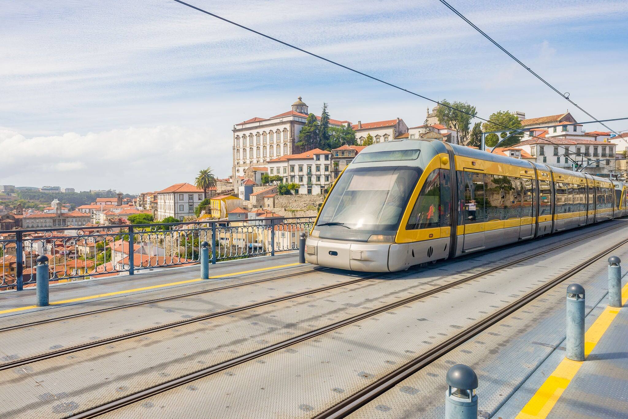 Porto Oporto metro subway tram rain train railway rail at bridge over Douro river, public transport illustration nobody