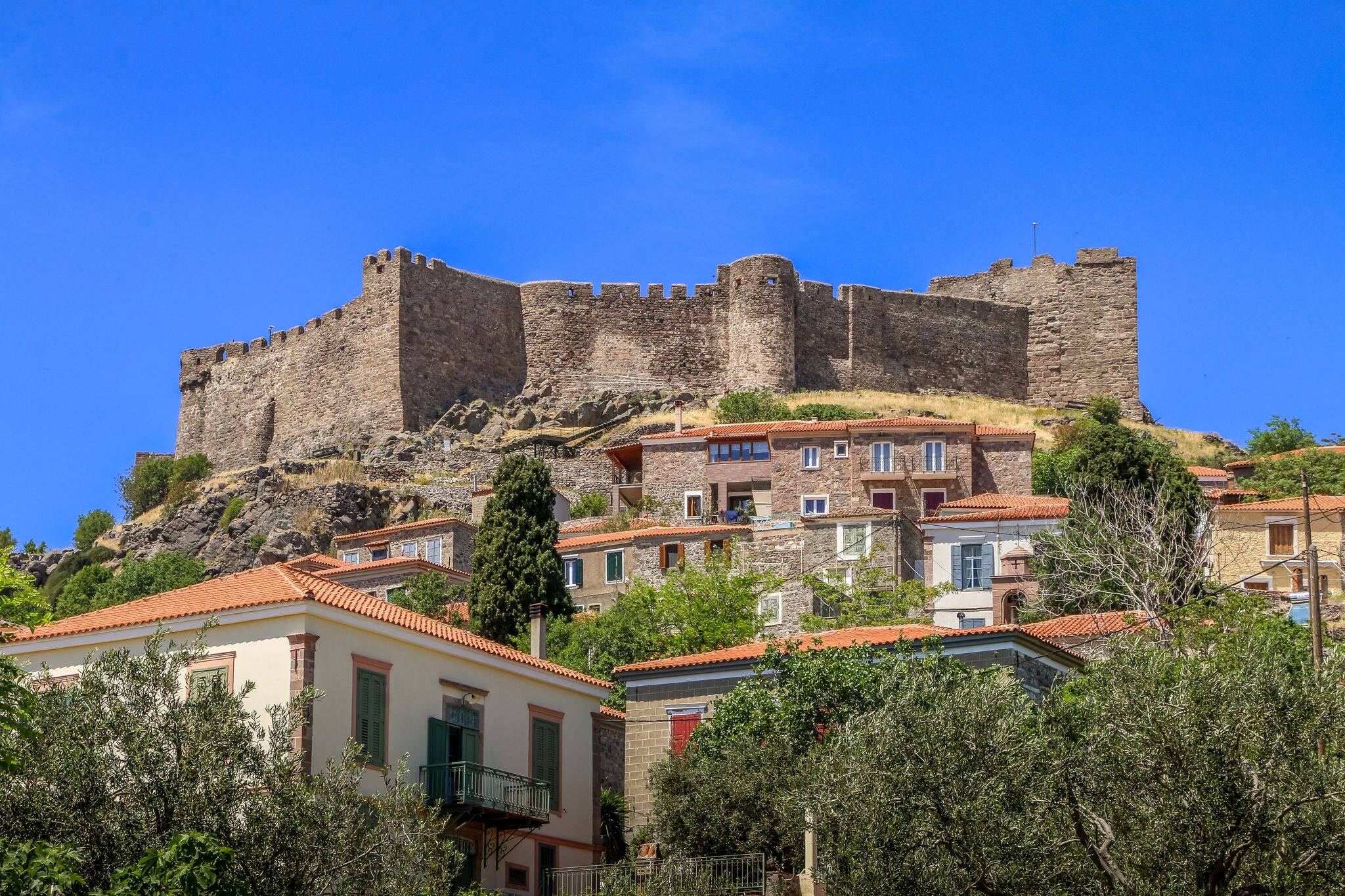 MOLYVOS, LESVOS ISLAND, GREECE Panoramic view of Molyvos village with its medieval castle.