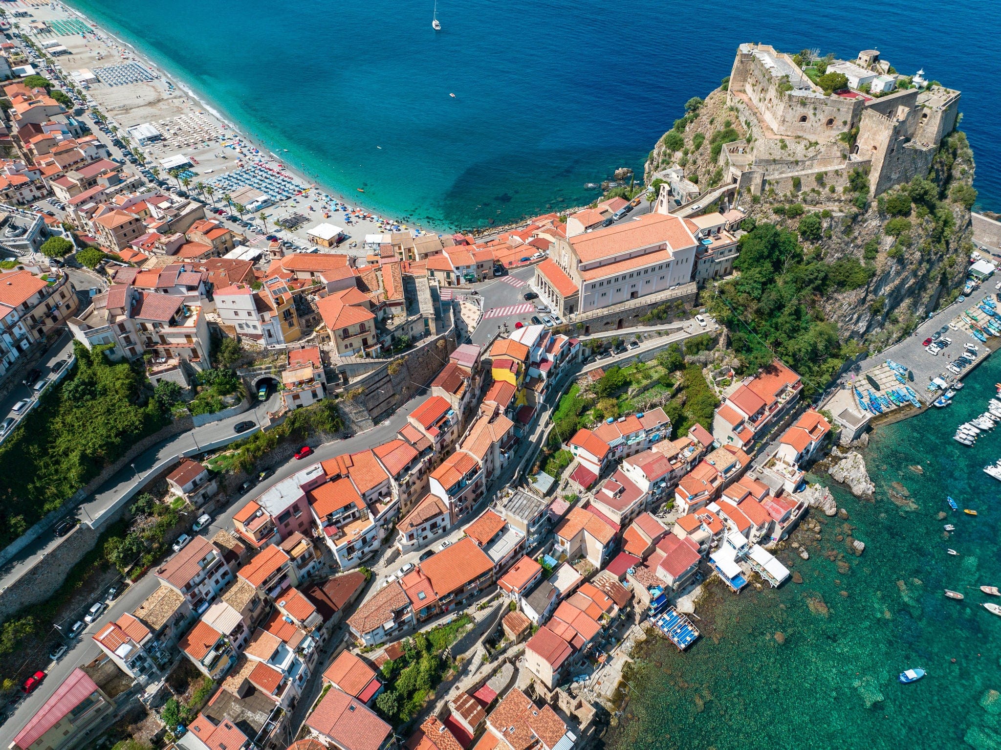 Aerial view of Scilla, Reggio Calabria, Calabria. Promontory at the northern entrance of the Strait of Messina. Ruffo Castle and lighthouse. Tyrrhenian Sea. Italy