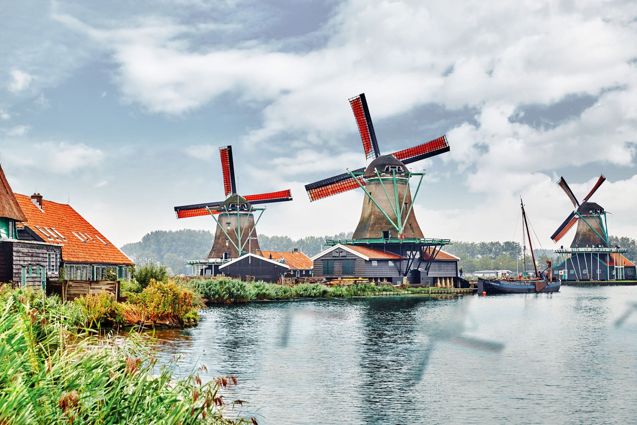 Unique old, authentic, real working windmills in the suburbs of Amsterdam, the Netherlands.