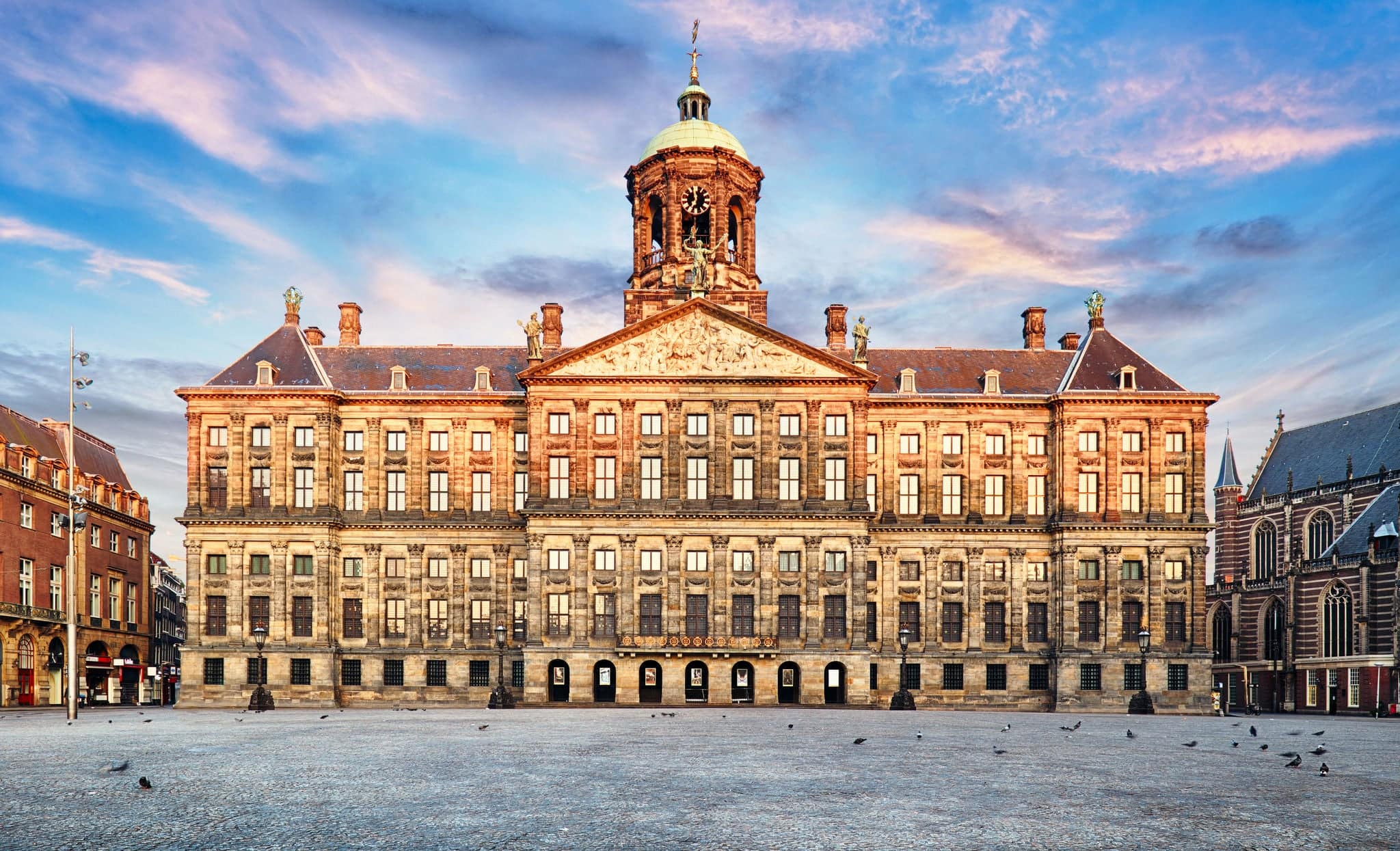 Royal Palace at the Dam Square in Amsterdam, Netherlands. No people in Dam Square in Amsterdam, Netherlands.