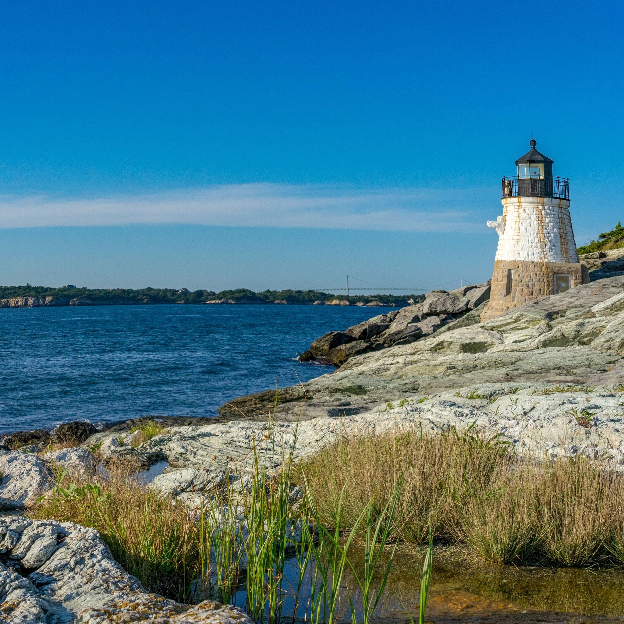 Beautiful lighthouse overlooking the ocean at sunset, near Newport Rhode Island