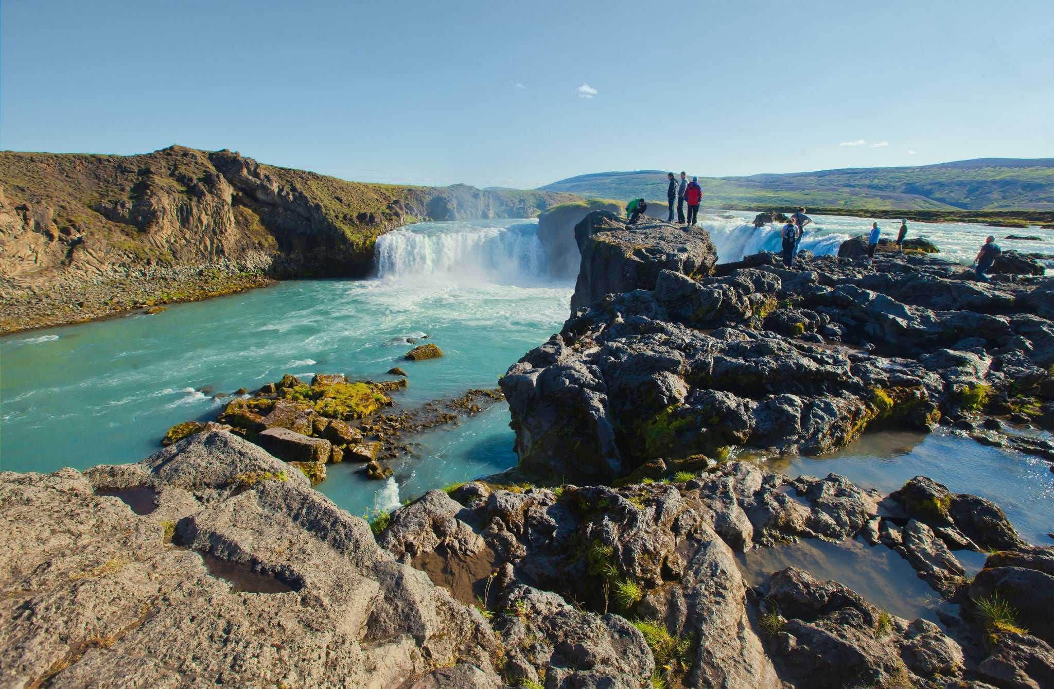 Beautiful vibrant landscape picture of famous Icelandic Waterfall in Iceland