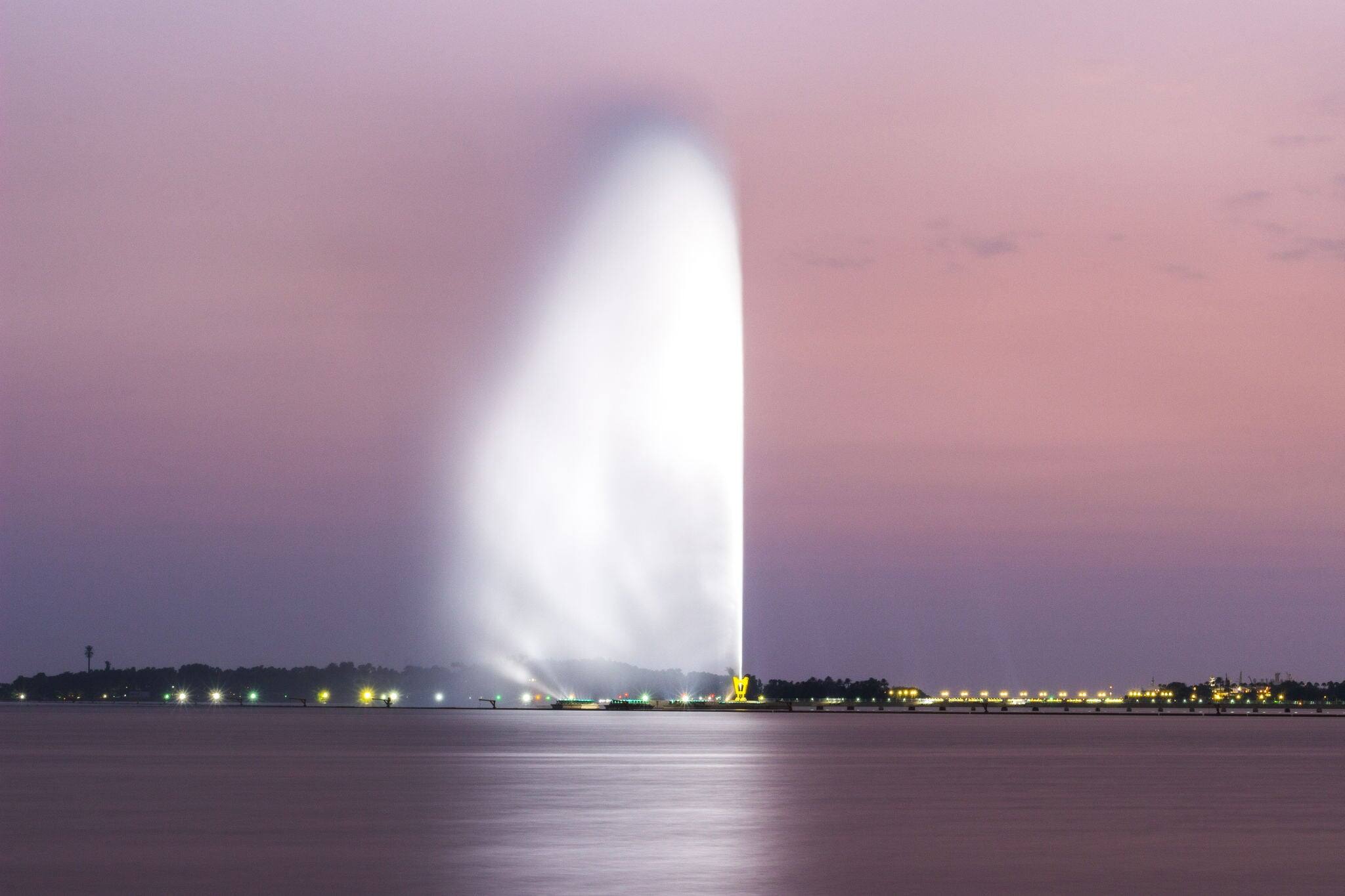 King Fahd's fountain in Jeddah jets water in the air with night illumination. The biggest fountain in the world. Jeddah. Saudi Arabia, Red Sea