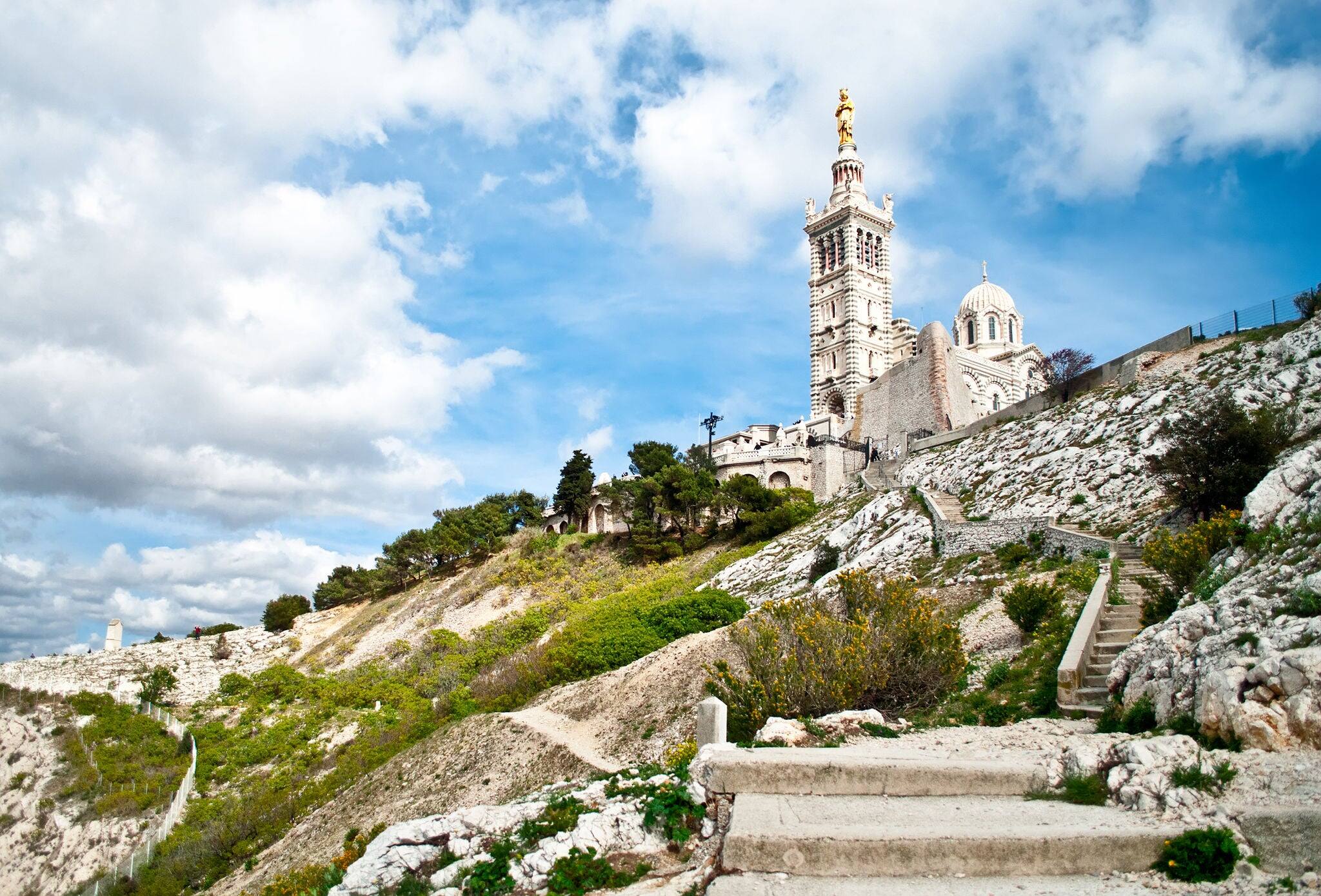 Notre-Dame de la Garde (literally Our Lady of the Guard), the basilica in Marseille, France. This ornate Neo-Byzantine church is situated at the highest natural point of the city.