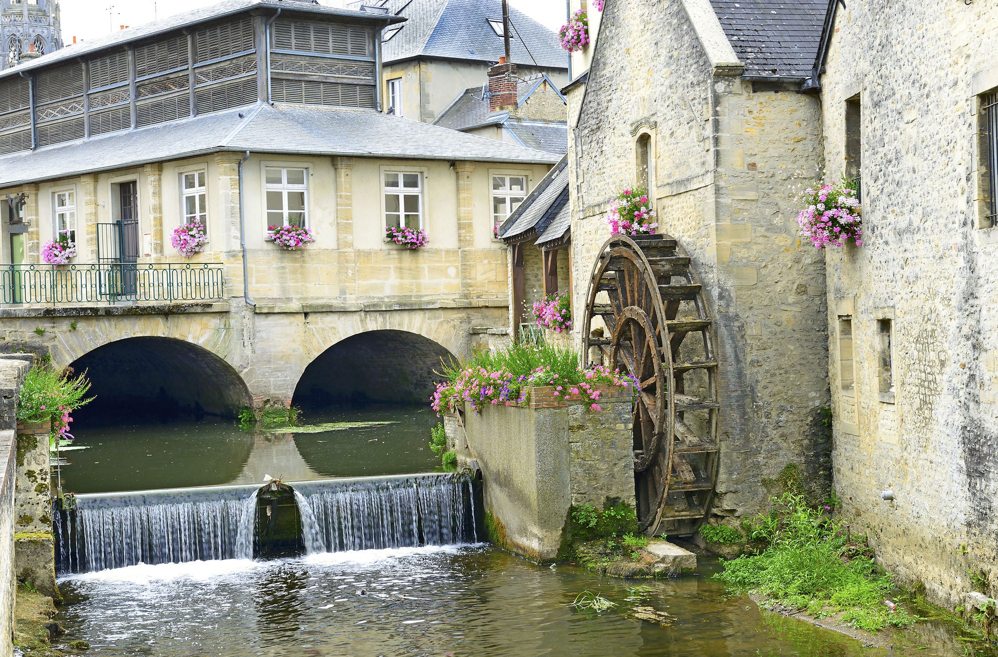 Old mill on river in the town of Bayeux. Normandy, France