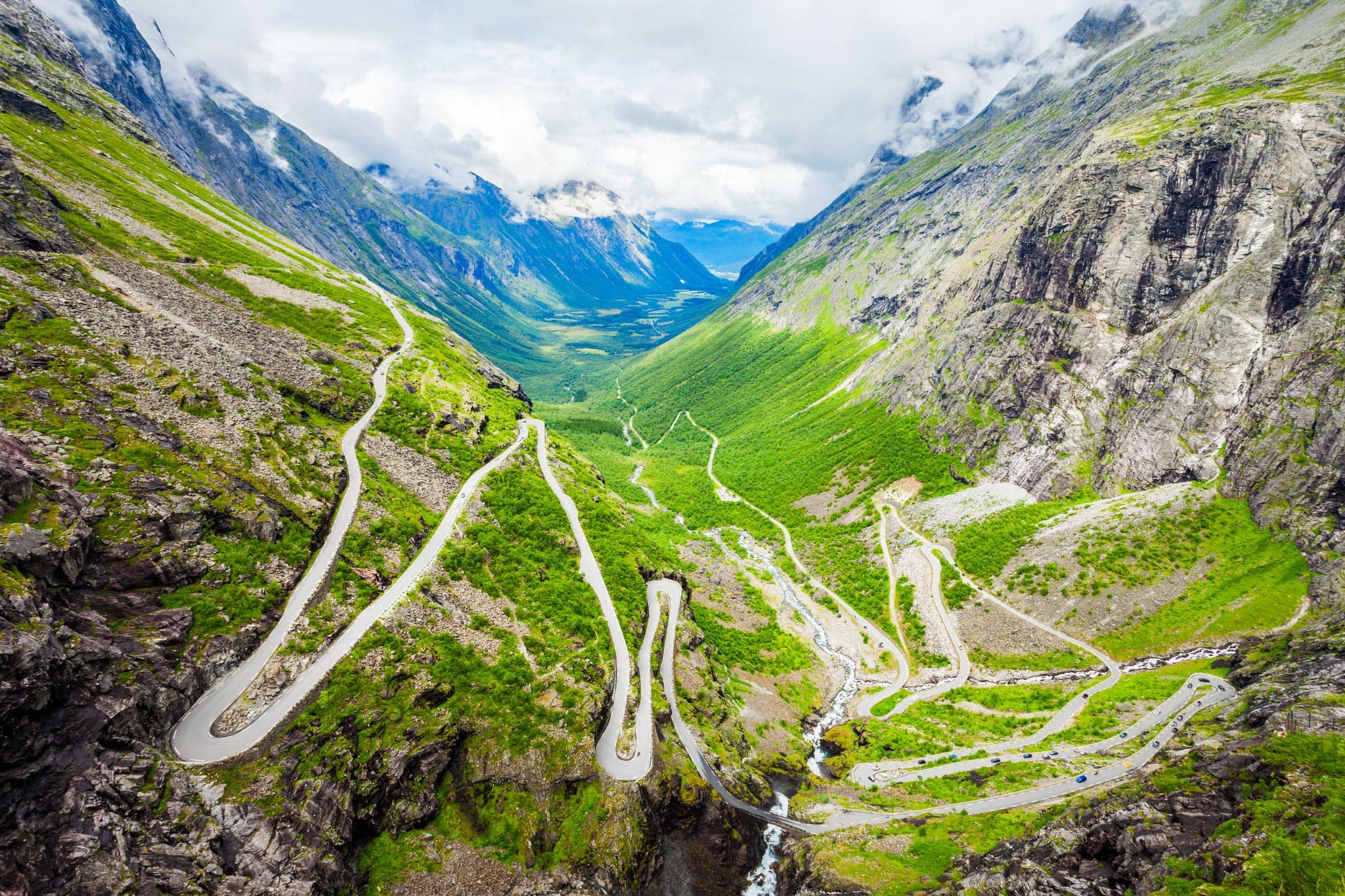 Trollstigen or Trolls Path is a serpentine mountain road in Rauma Municipality in Norway