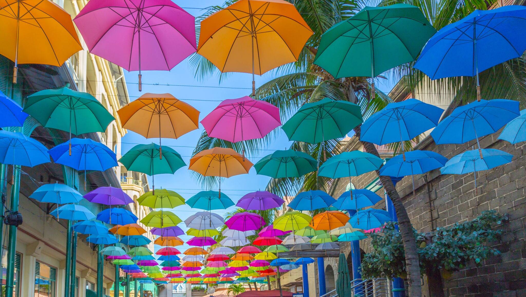 port louis le caudan waterfront umbrellas capital of Mauritius.