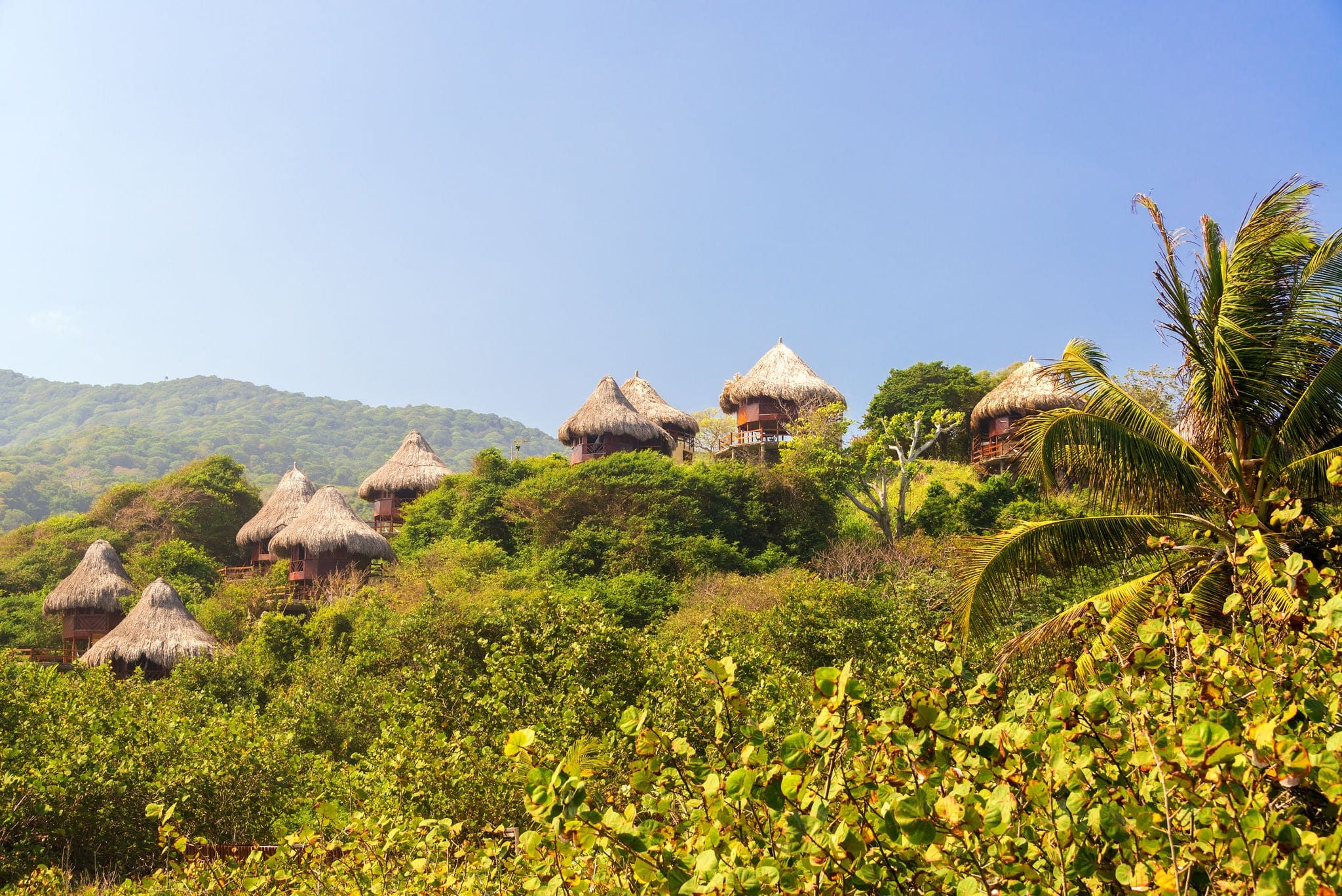 Rustic huts in a jungle in Tayrona National Park near Santa Marta, Colombia