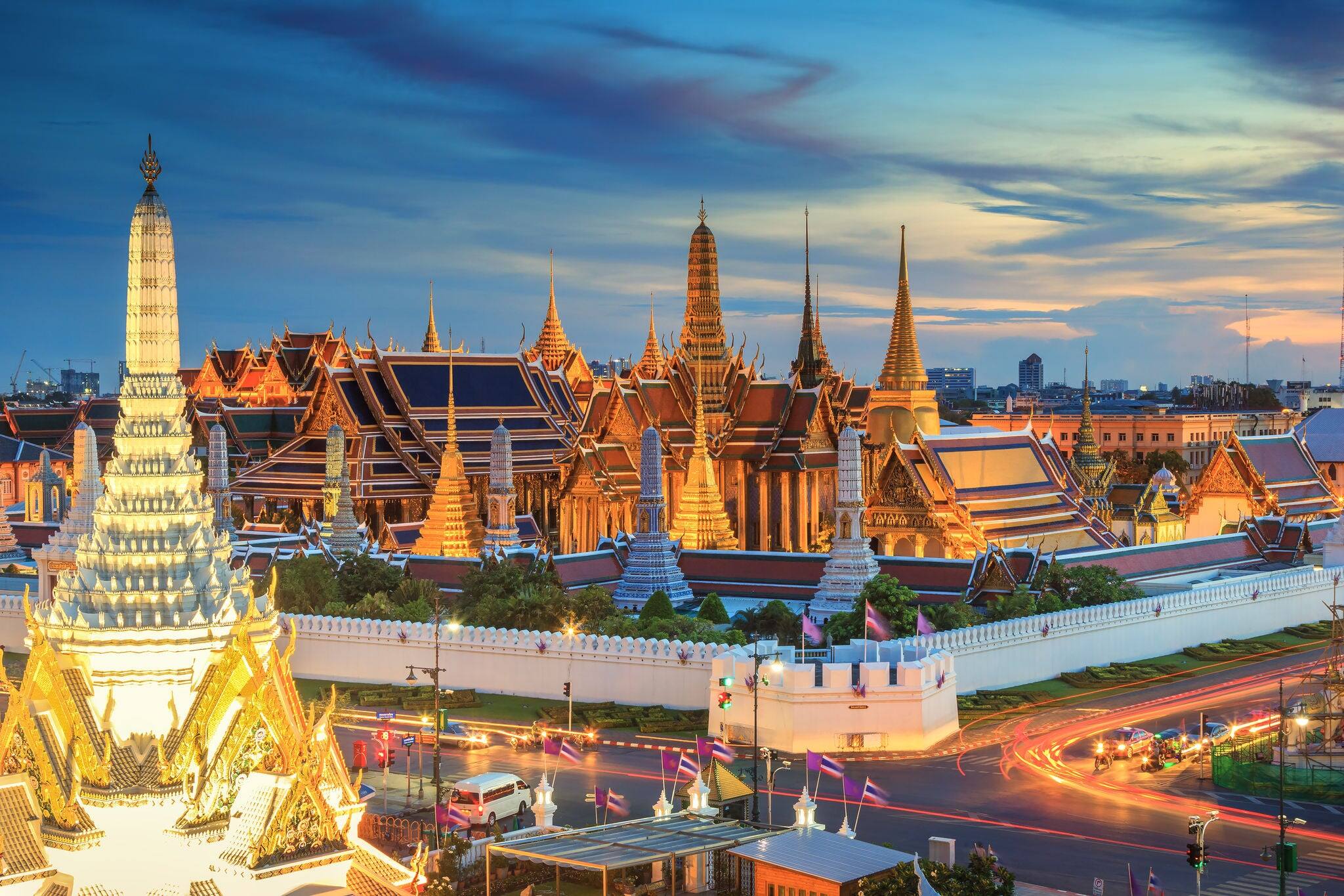 Grand palace and Wat phra keaw at sunset Bangkok, Thailand. Beautiful Landmark of Asia.  Temple of the Emerald Buddha. landscape of the capital city. view of thailand