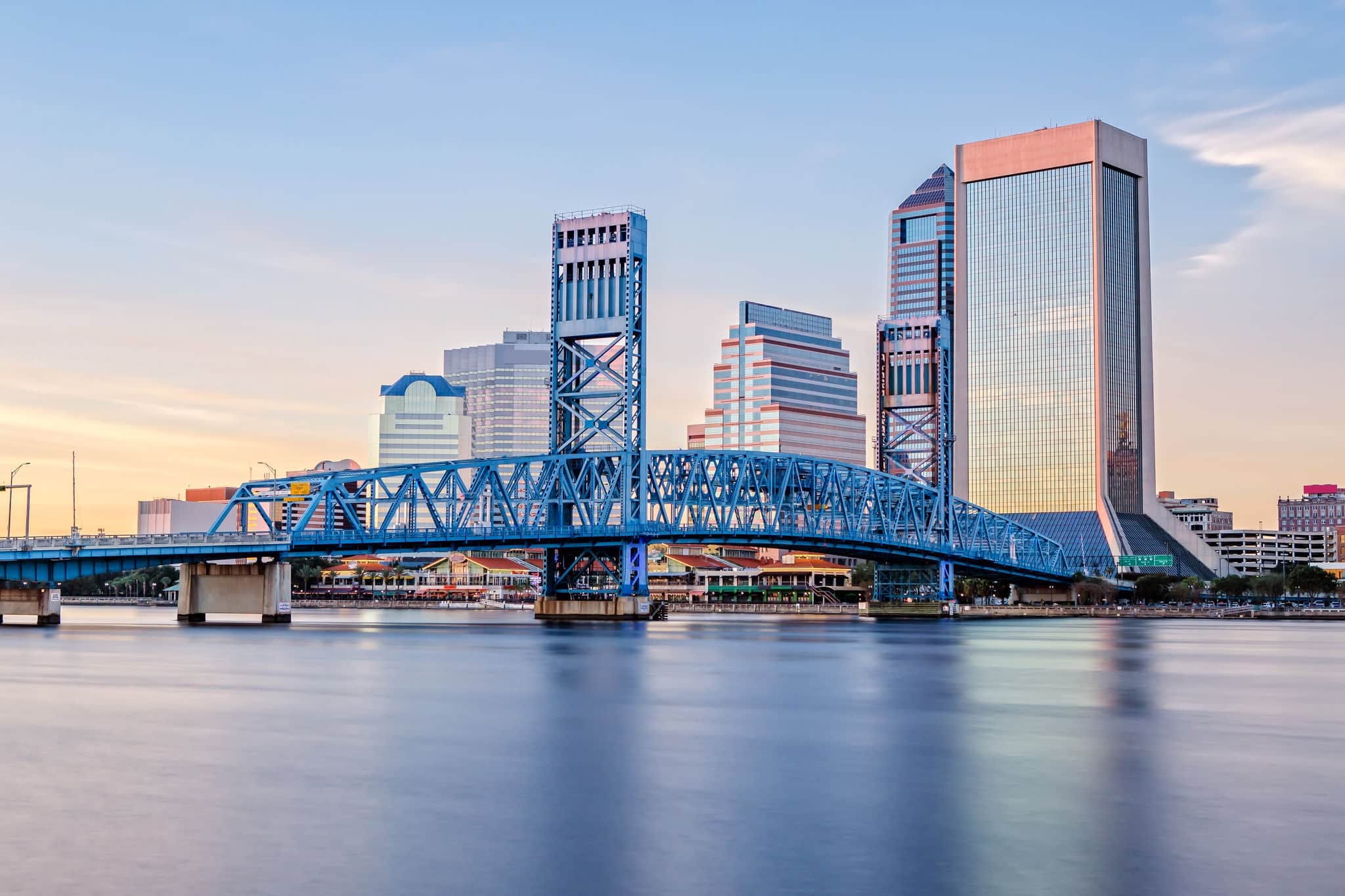 Skyline of Jacksonville, FL and Main Street Bridge at Sunset