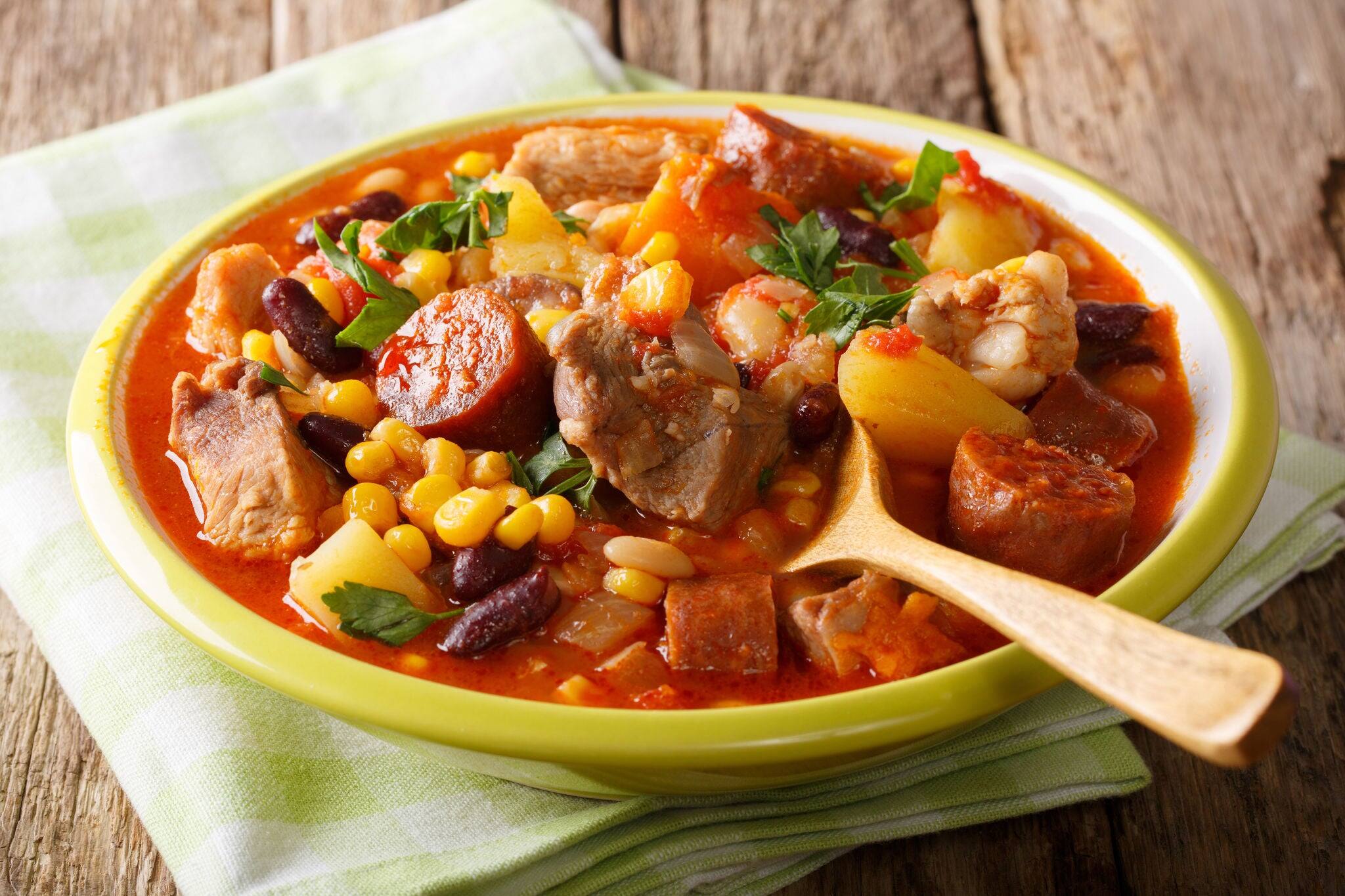 Cachupa is the signature dish of the Cape Verde Islands in Africa. Is a slow cooked stew of corn, beans, vegetables and meat.