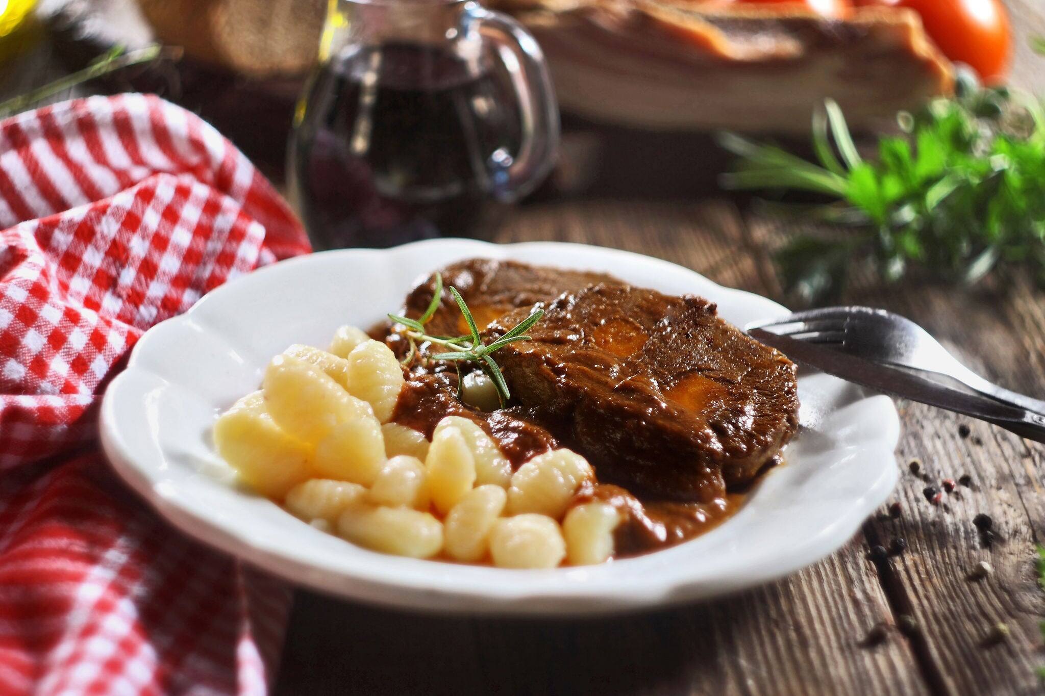 Pasticada with gnocchi, beef stew in a sauce. Croatian cuisine