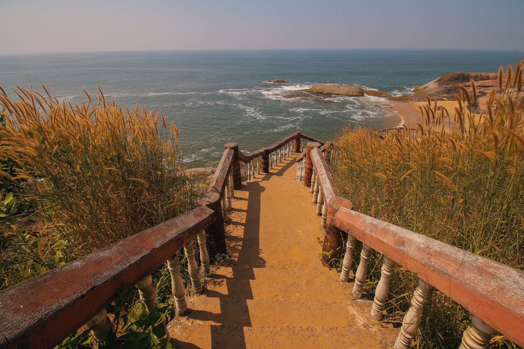 Stairway to Someshwara beach near Mangalore , Karnataka INDIA. secluded rocky beach.