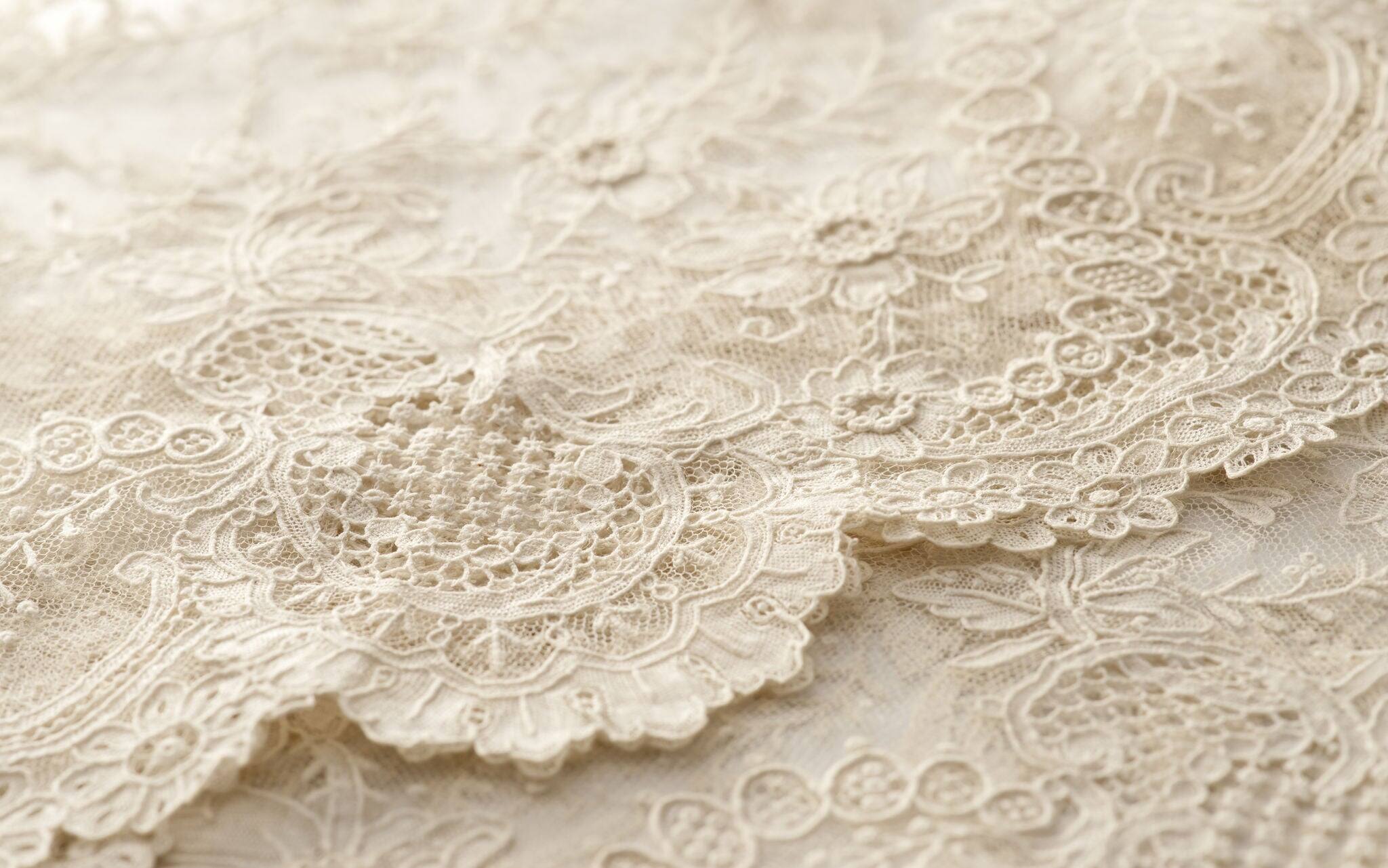 a background image of ivory-colored lace cloth