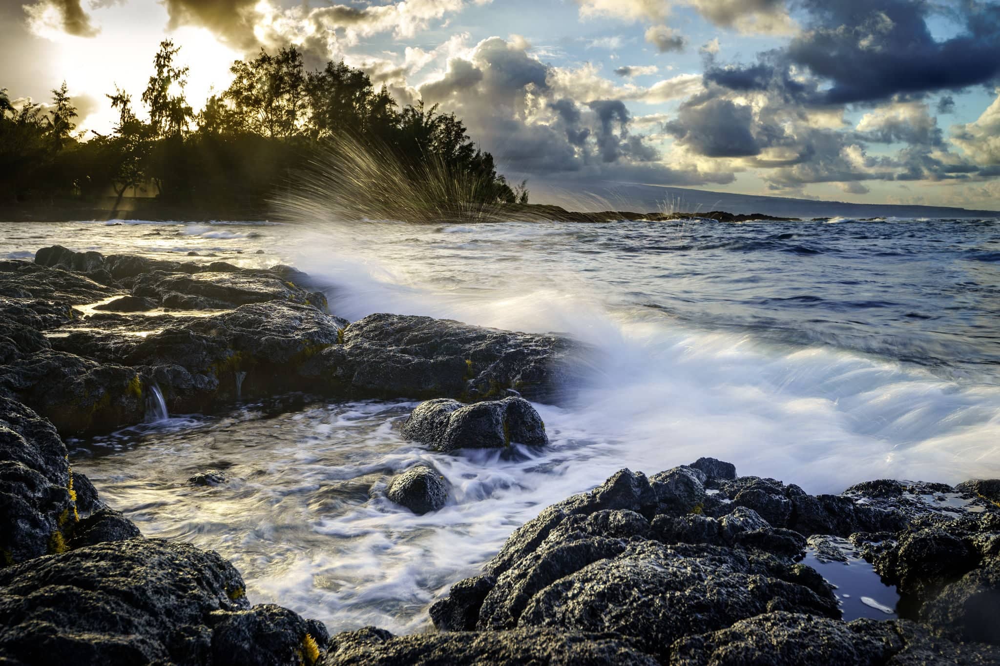 Sunset at ocean coast in Hilo, Hawaii, Big Island.