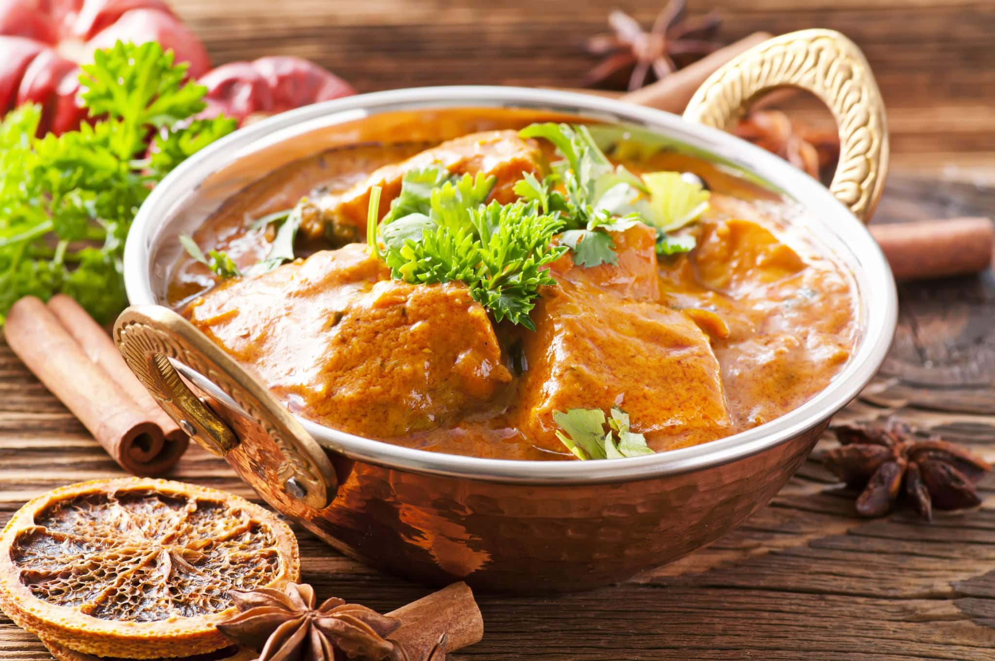 Fish curry in copper bowl