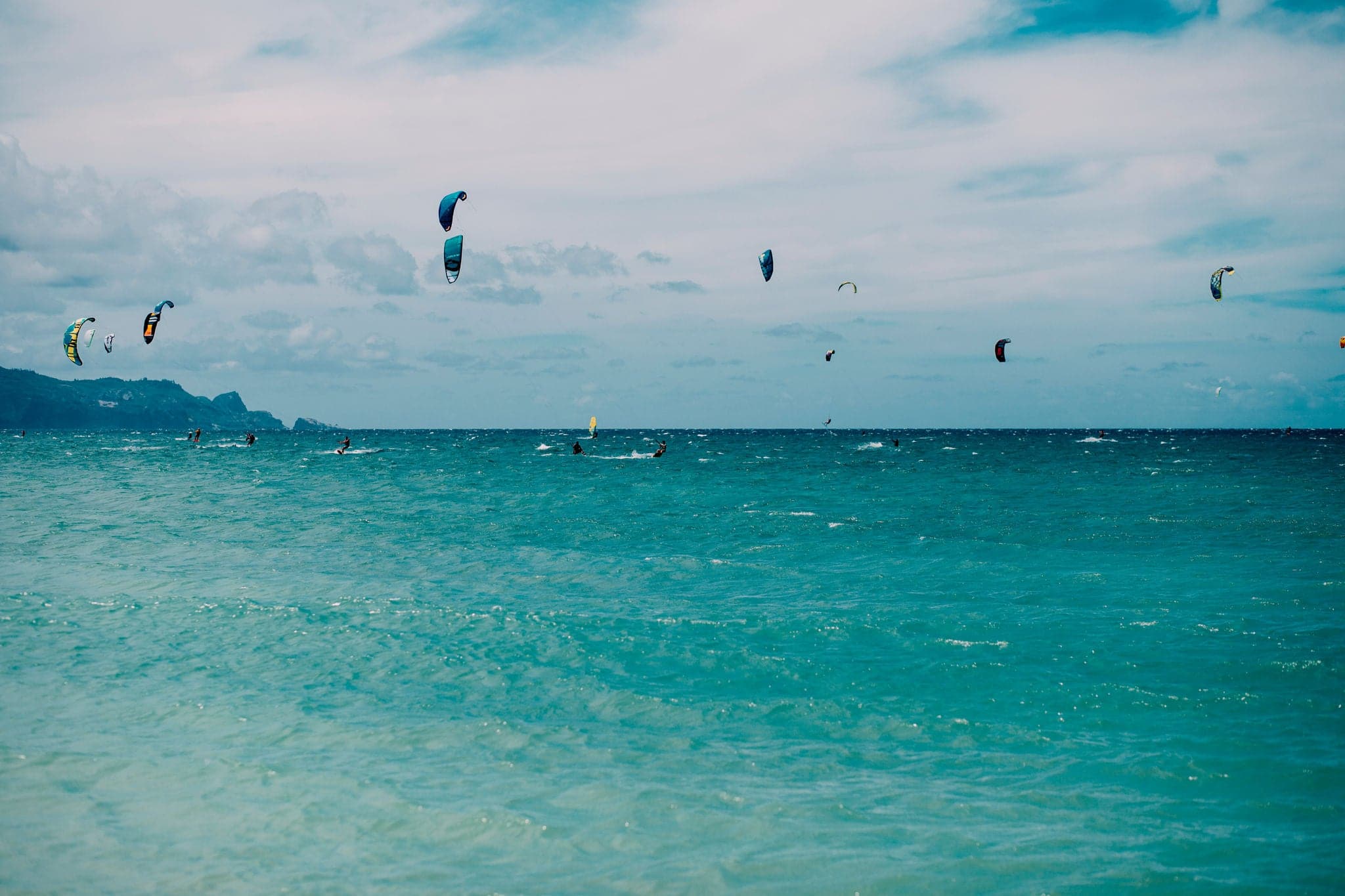 Kitesurfers at Kanaha Beach Park in Maui, Hawaii