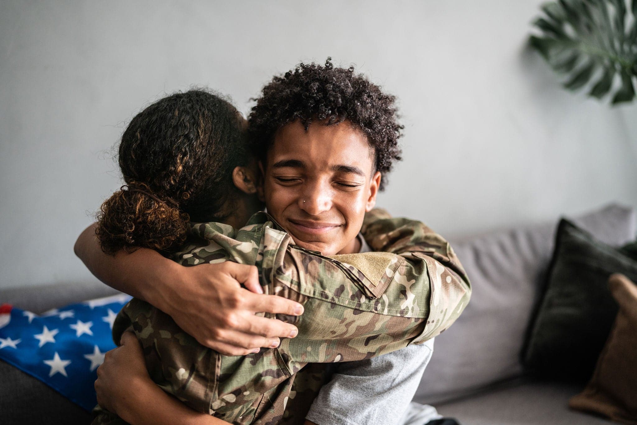 Veteran family hugging