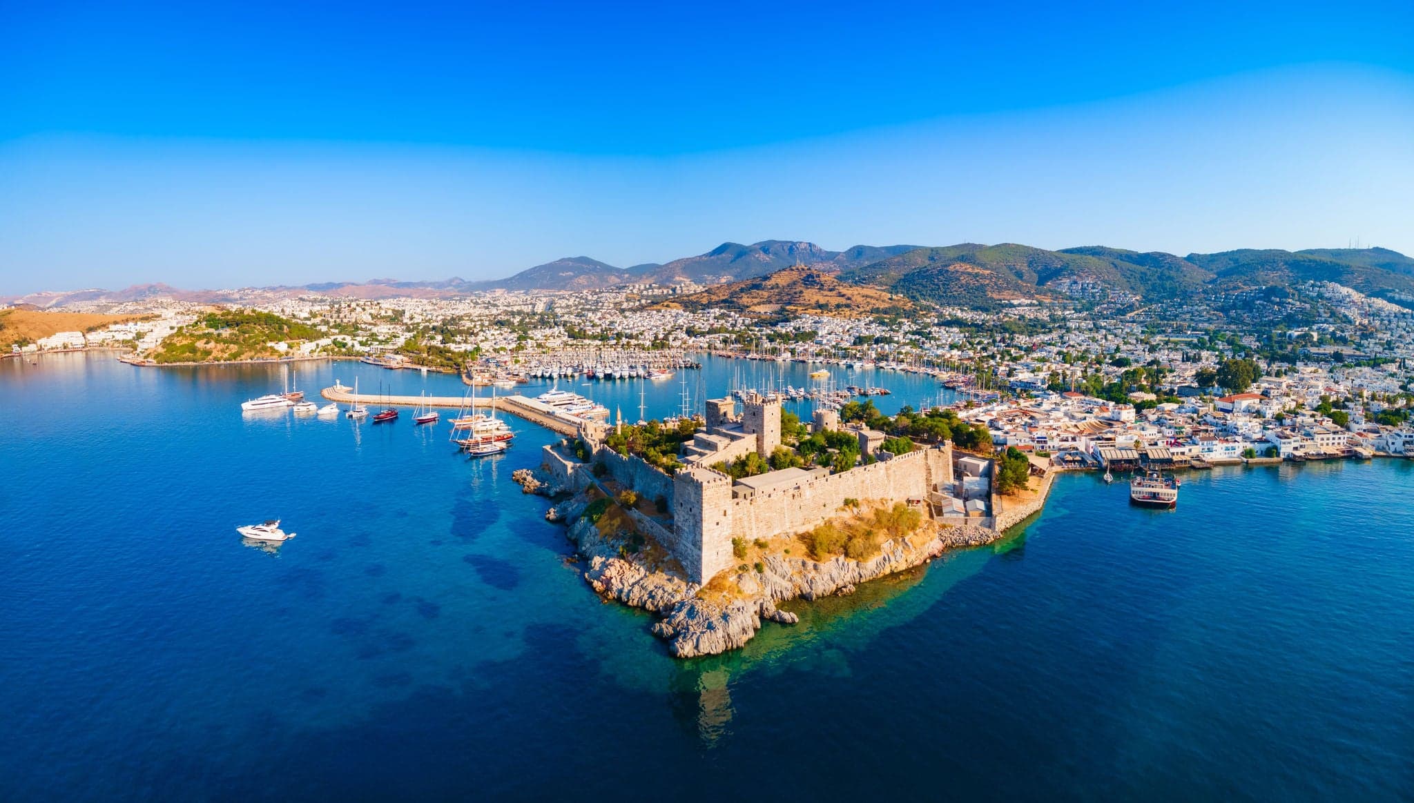 The Bodrum Castle of St. Peter and marina aerial panoramic view in Bodrum city. Bodrum is a city in Mugla Province, Turkey.