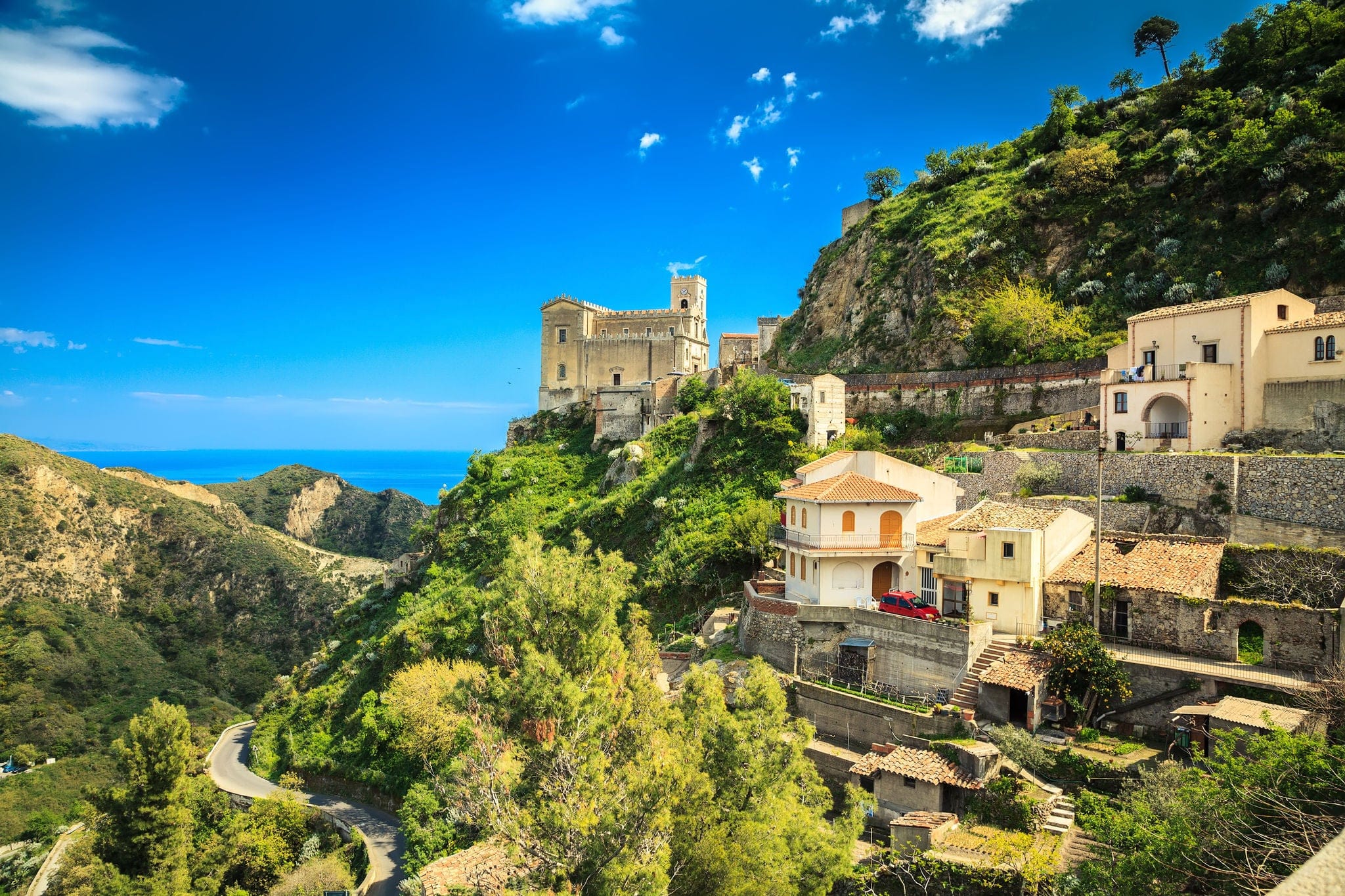 Church of St. Nicolo stands on the hill. This is Savoca, small village near Taormina on the east side of Sicily, Italy