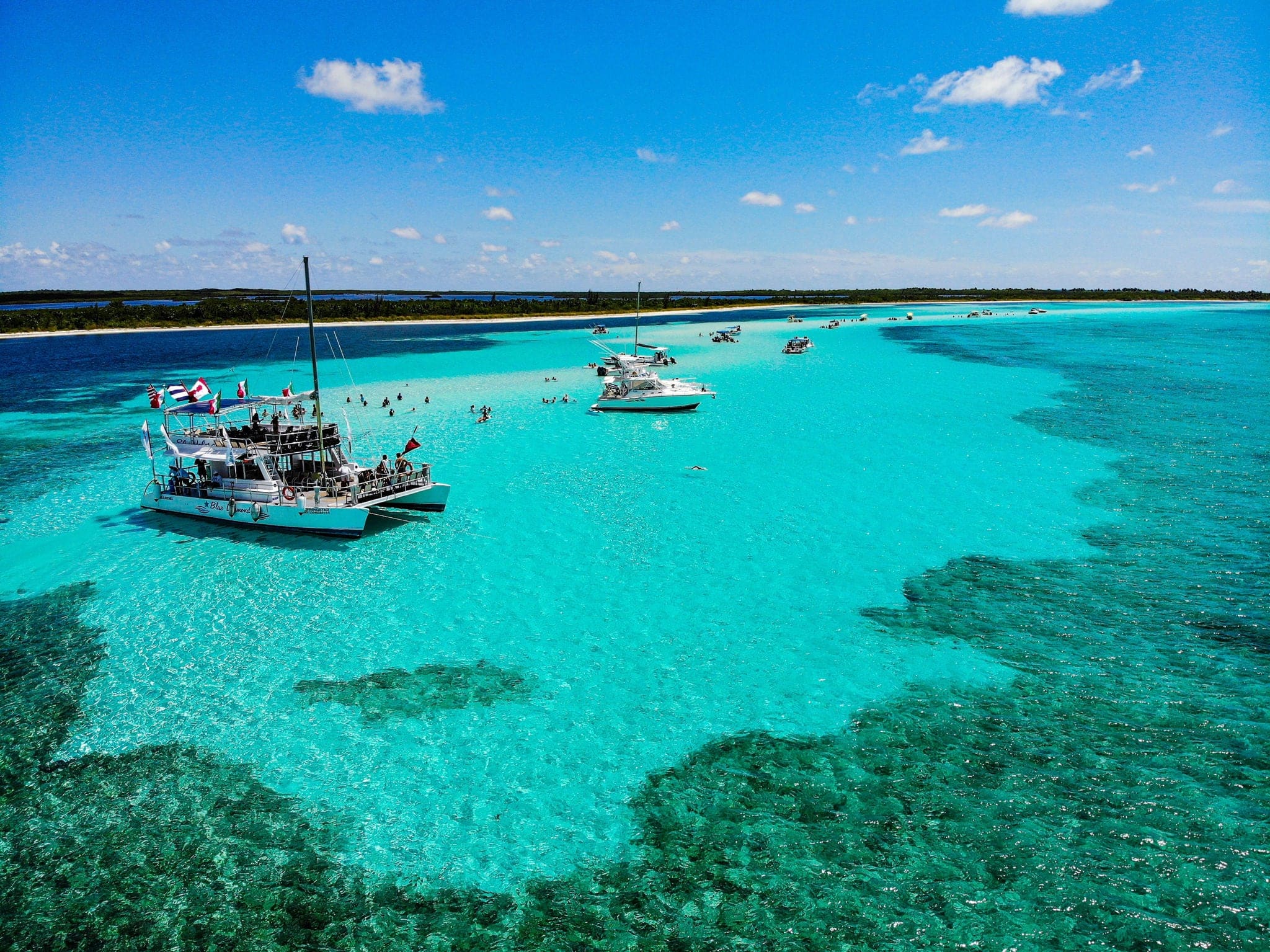 Catamaran in paradise beach of cozumel island