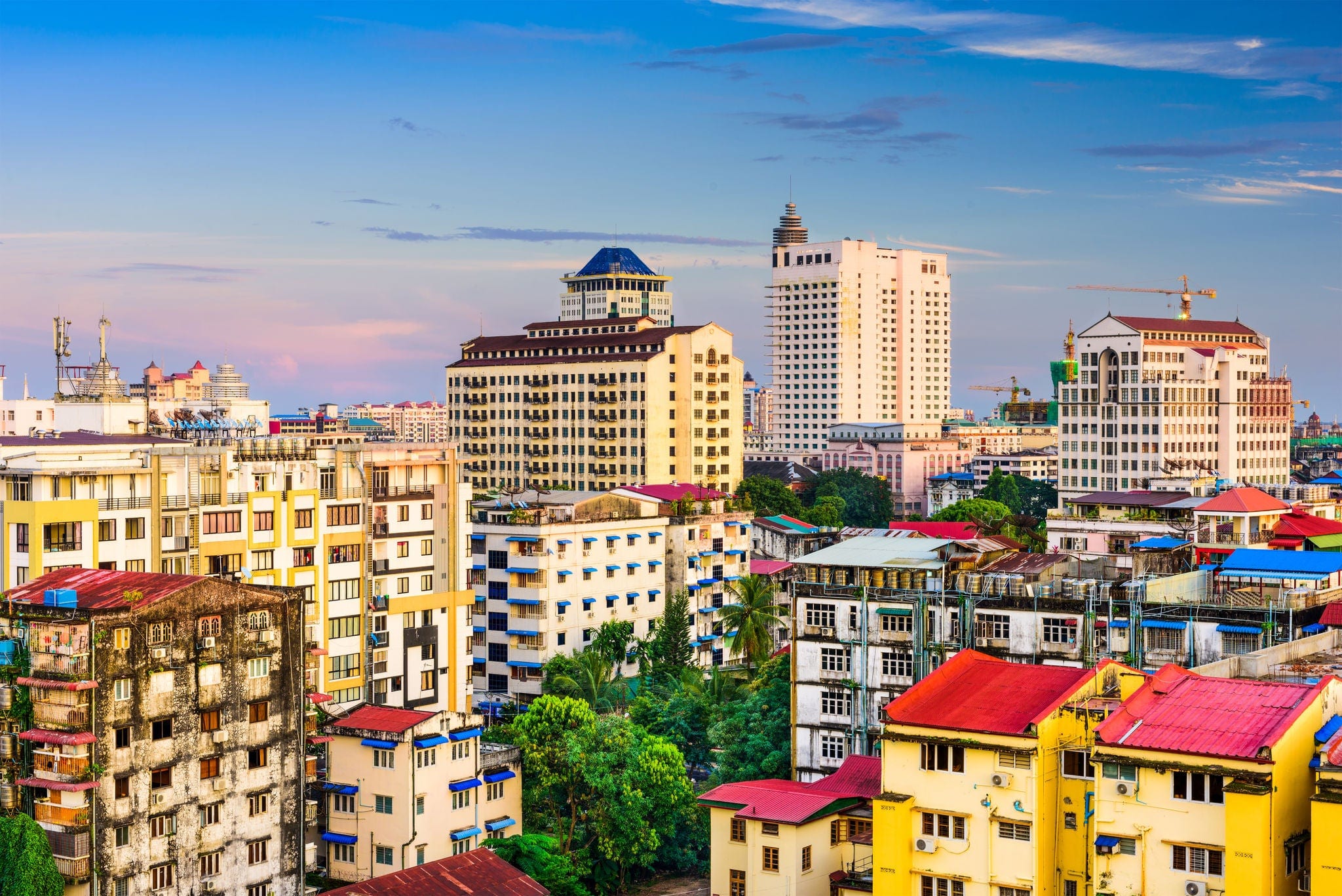 Yangon, Myanmar downtown skyline at dusk.