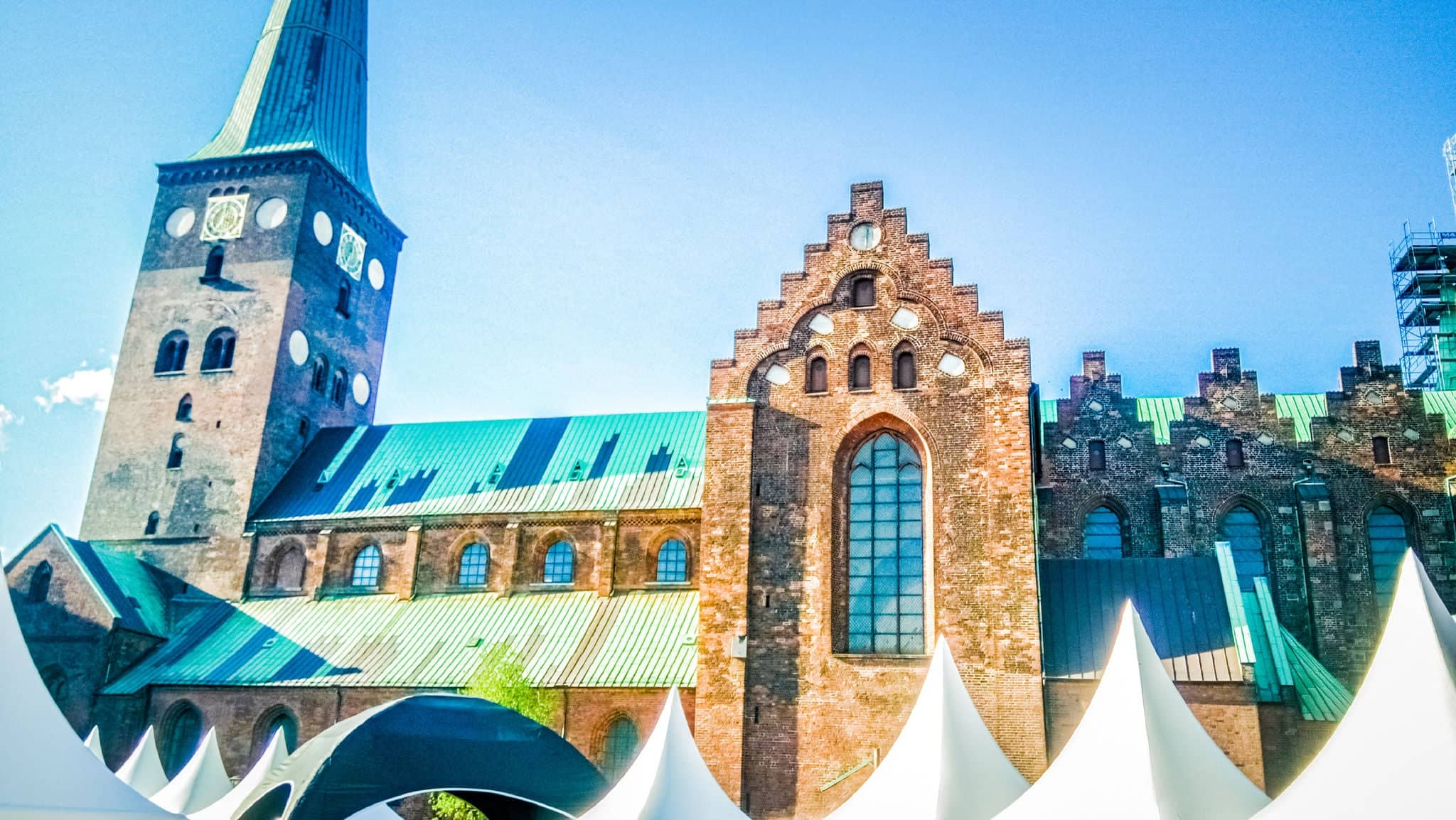 An old church in Scandinavian architectural style is located downtown of Aarhus, Denmark. Typical Danish architecture in Aarhus, a famous city on the east coast of Jutland region in Denmark.
