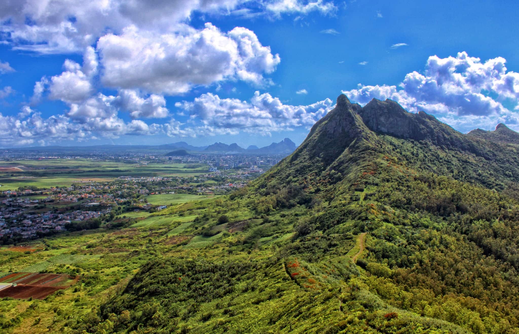 View of Guiby peak and Moka range from the summit of 'Le Pouce' mountain located in Saint-Pierre, Mauritius