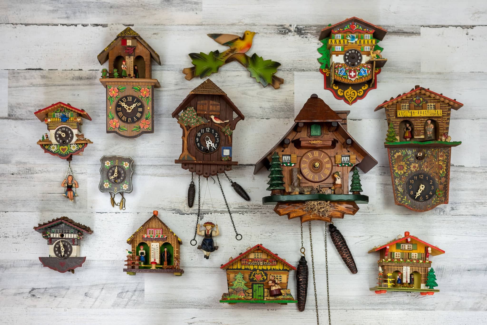 Collection of vintage handpainted wooden cuckoo clocks