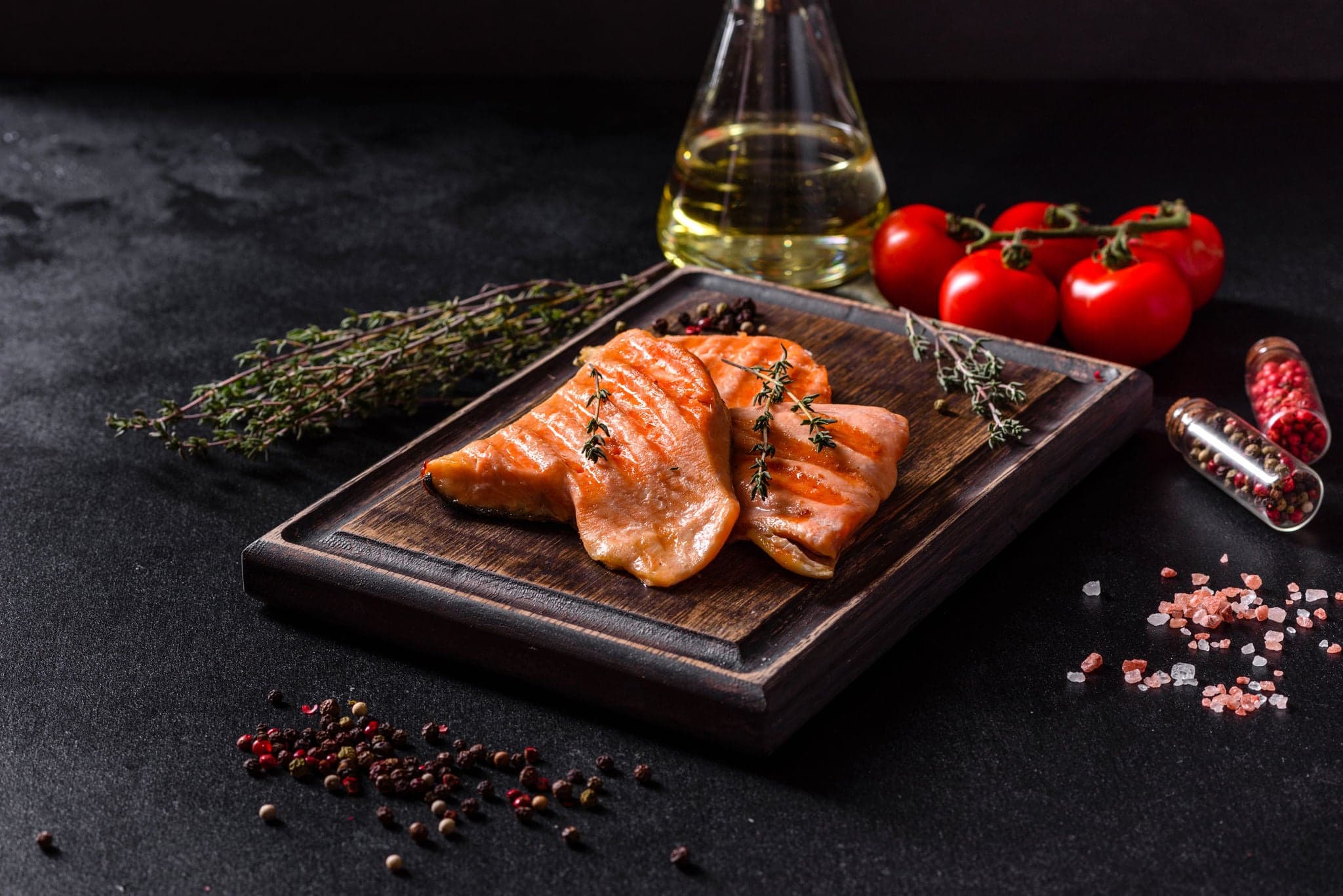 Tasty fresh red fish arctic char baked on a grill. Source of omega, healthy food