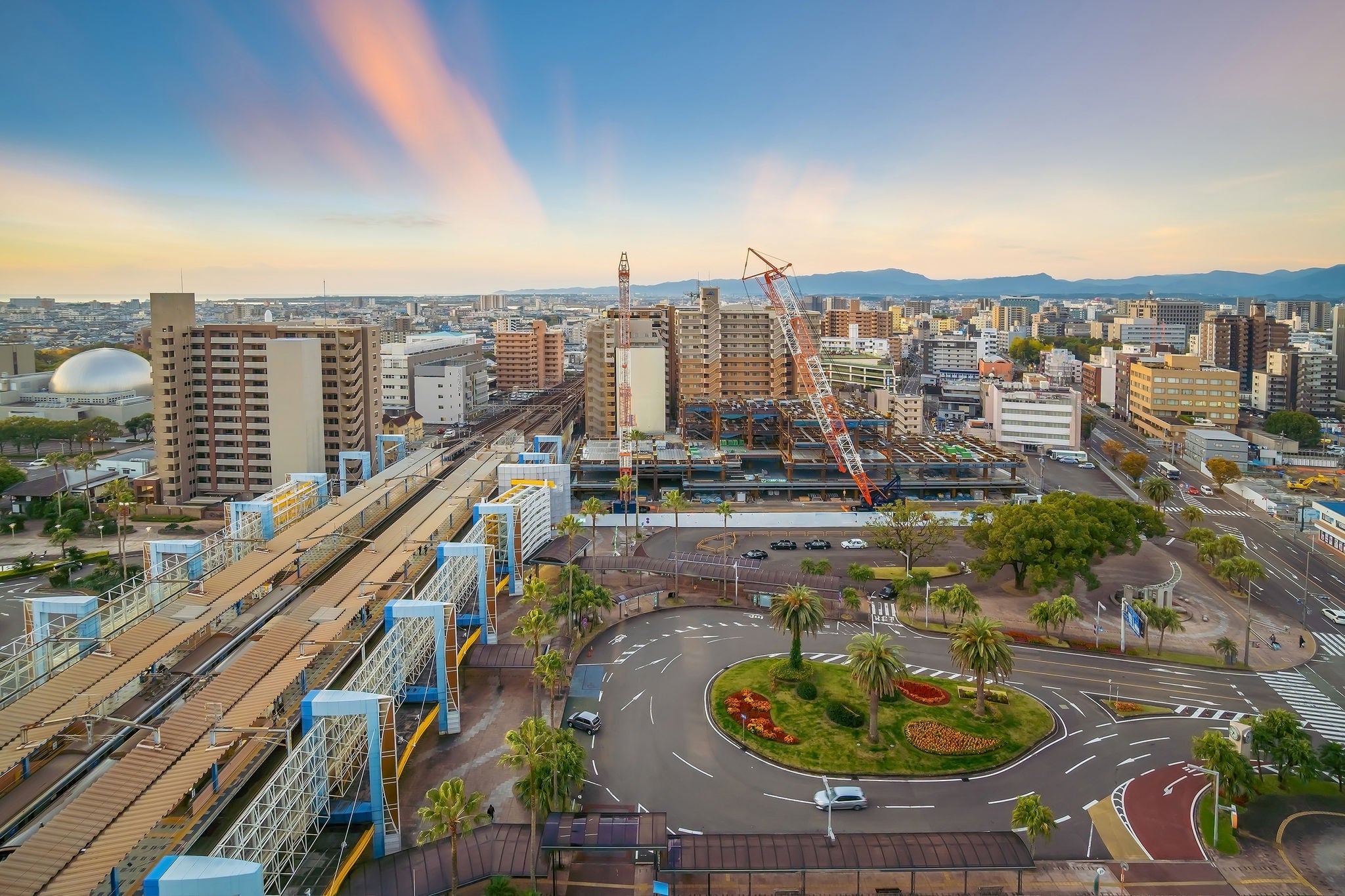 Miyazaki city downtown skyline cityscape  in Kyushu, Japan at sunset