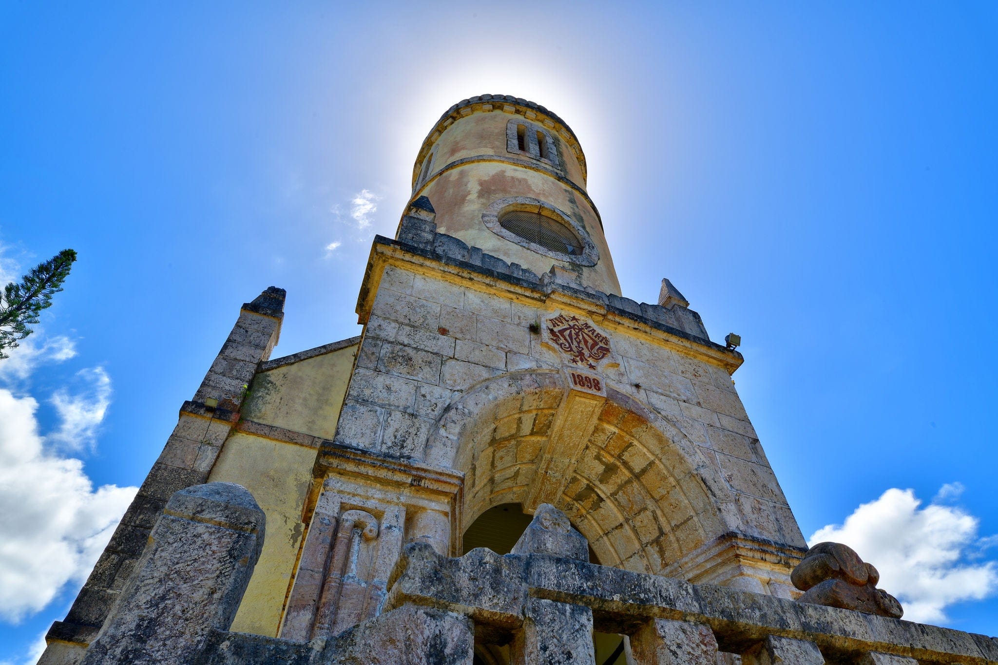 Church of St Francis Xavier, in the village of Easo, on Lifou Island, New Caledonia. Photographed with the miday sun centred on the tower.