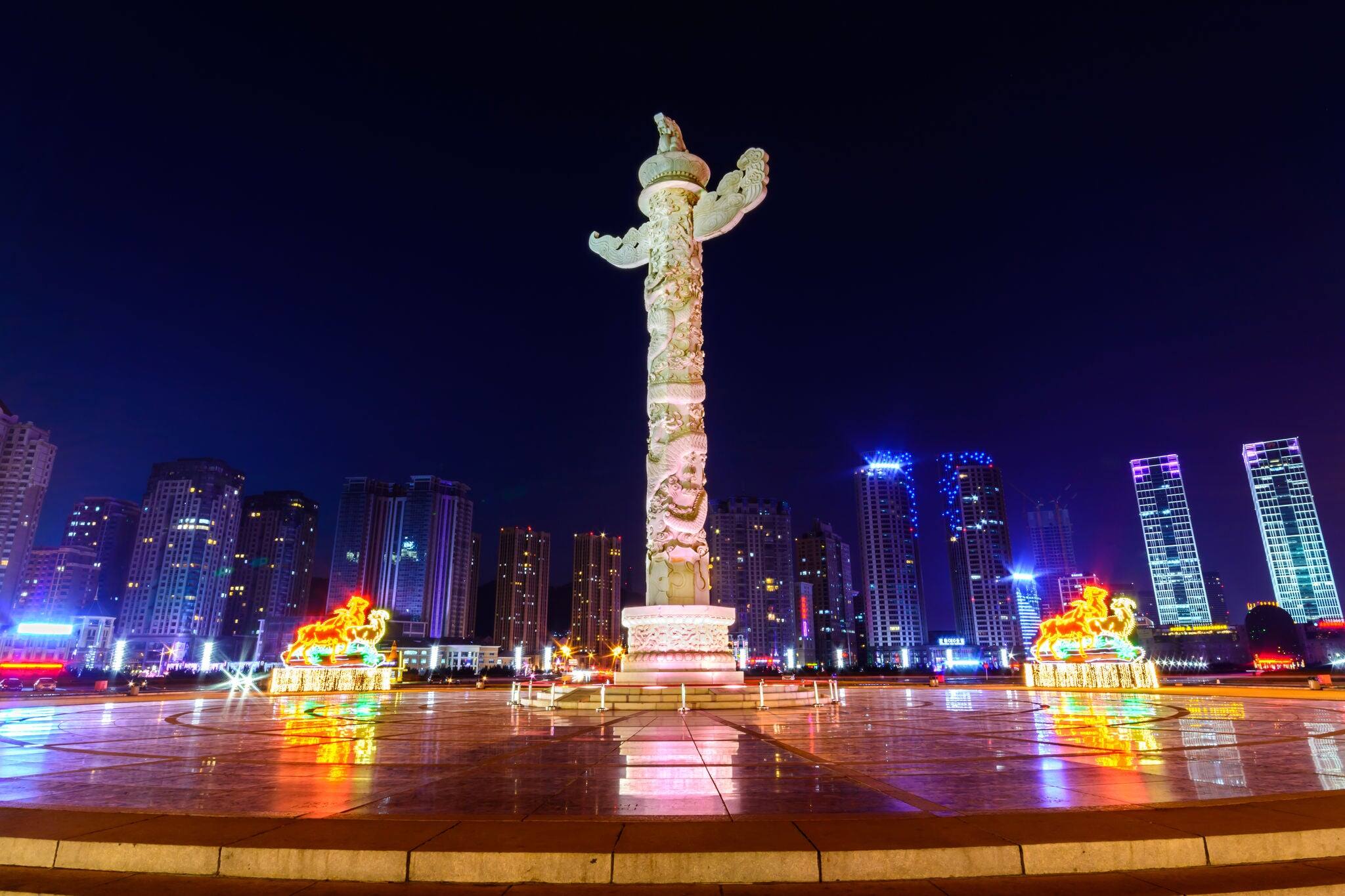 Ornamental column in Xinghai square, Dalian China at night