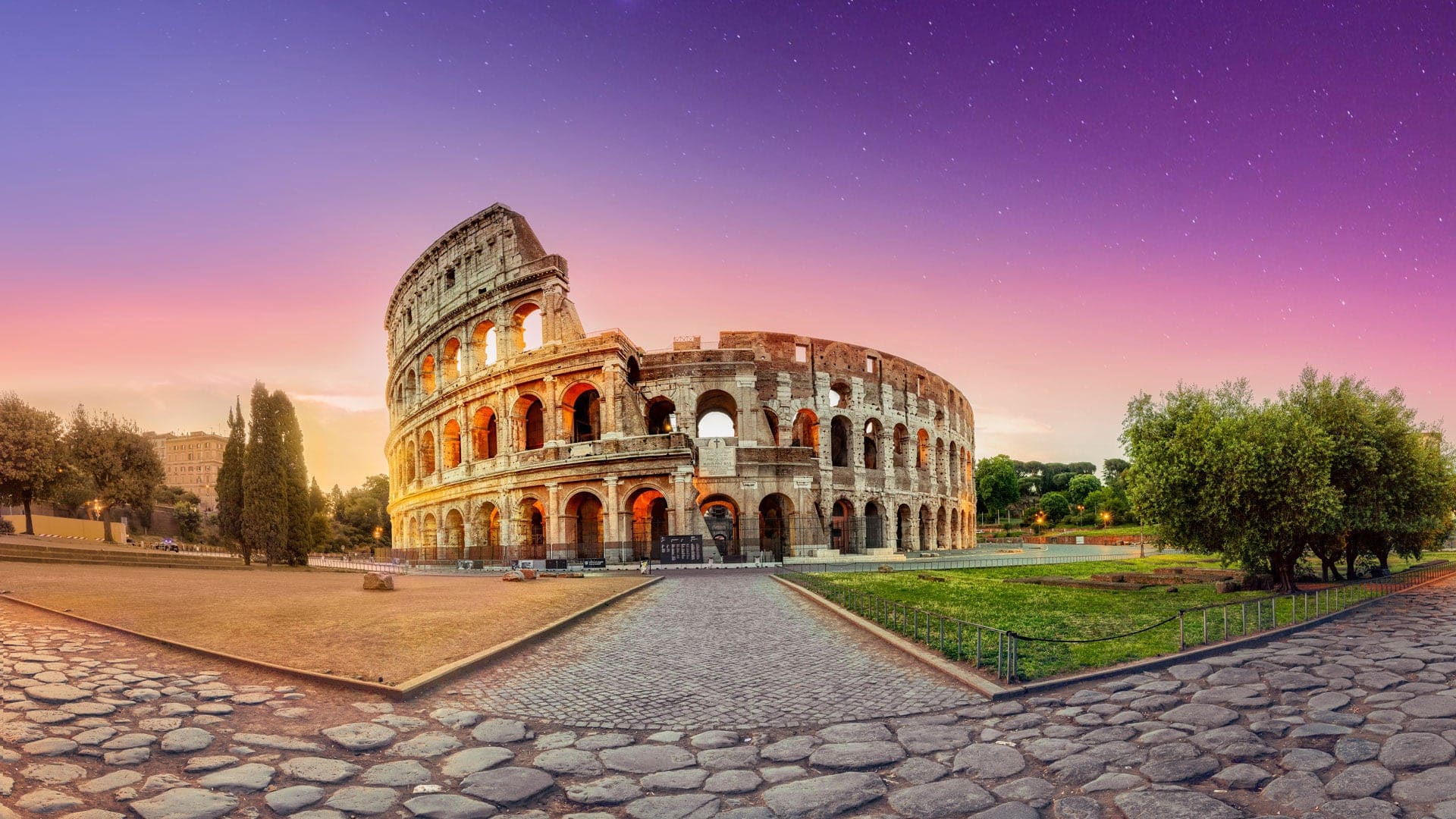 Colosseum in Rome and morning sun, Italy