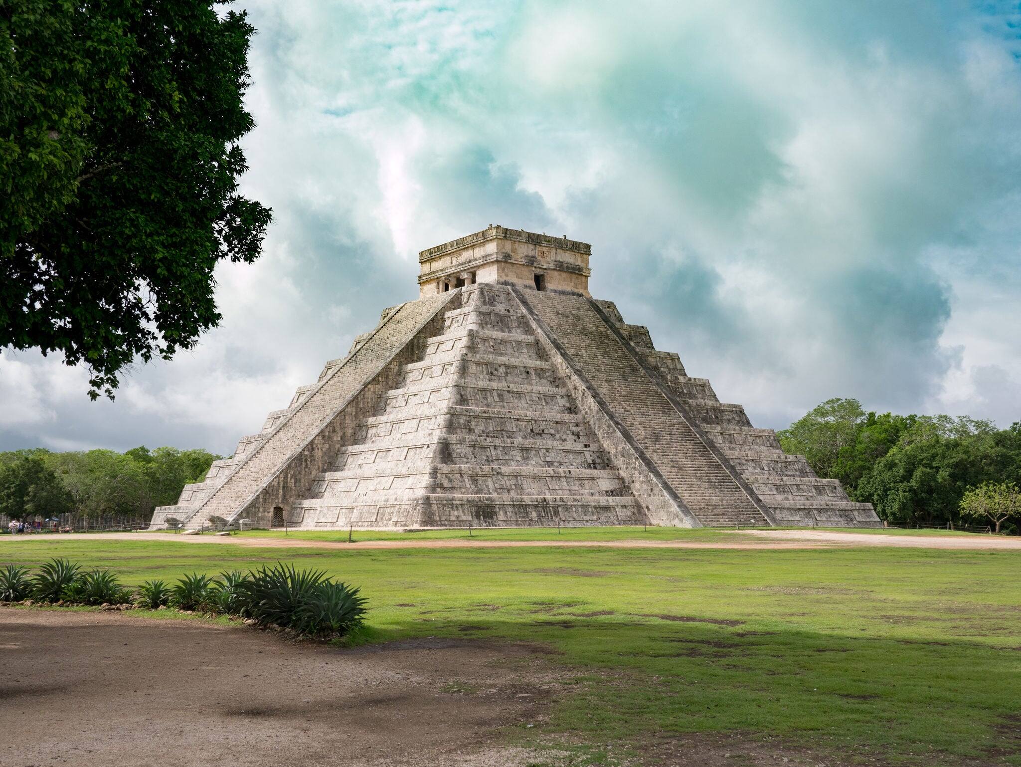 The internationally famomus landmark chichen itza, a historic maya temple in Yucatan, Mexico, shot during cloudy day