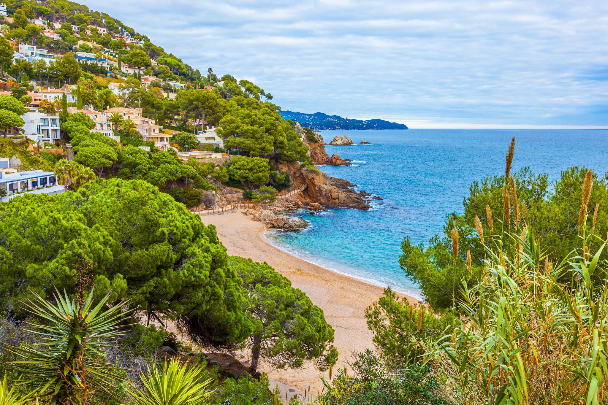 Costa Brava bay and beach with turquoise waters. Cala de Sant Francesc, Blanes.