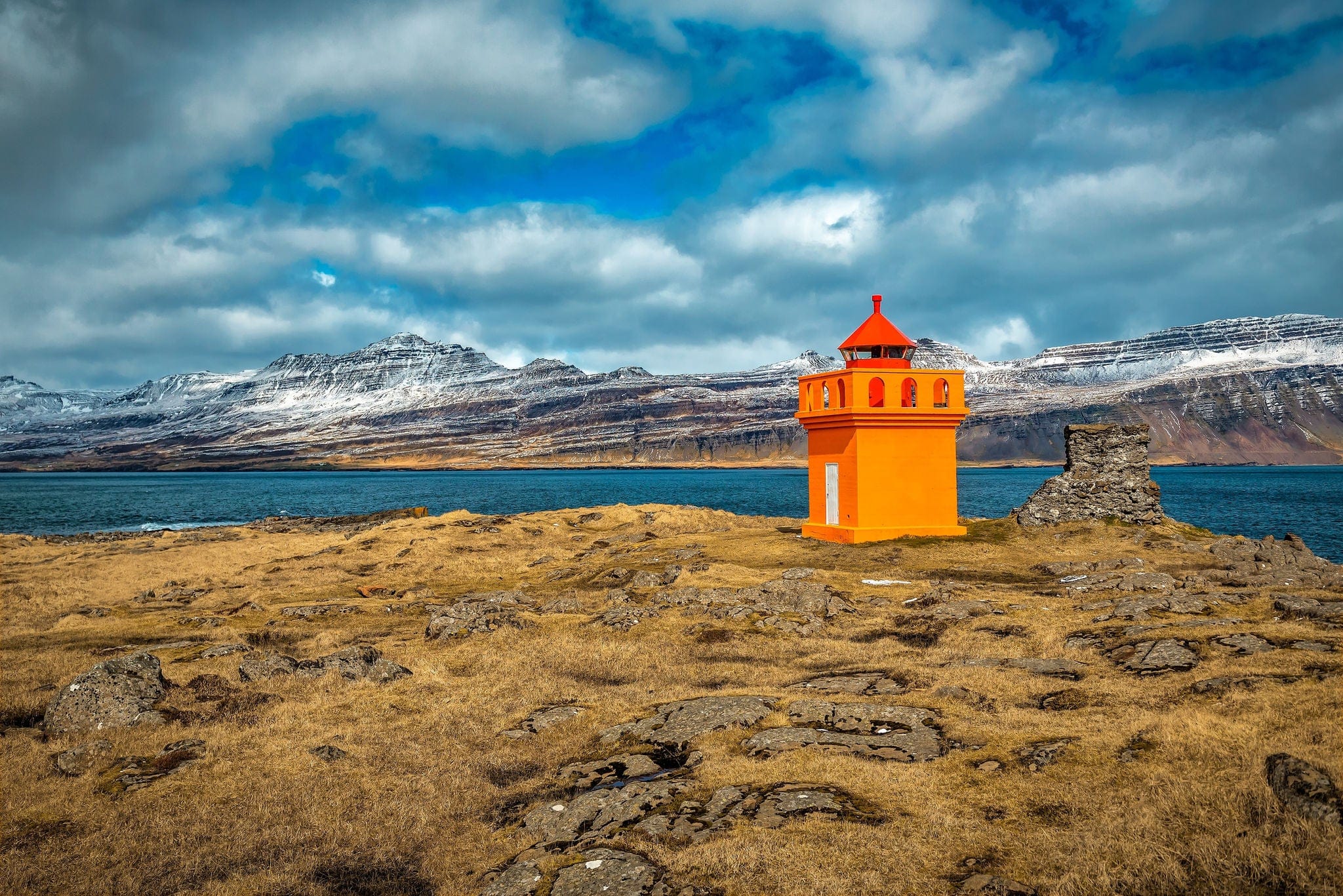 Djupivogur Lighthouse is located on the southeast coast of Iceland, on a rocky point on the west side of the port of Dj?pivogur. Travel theme