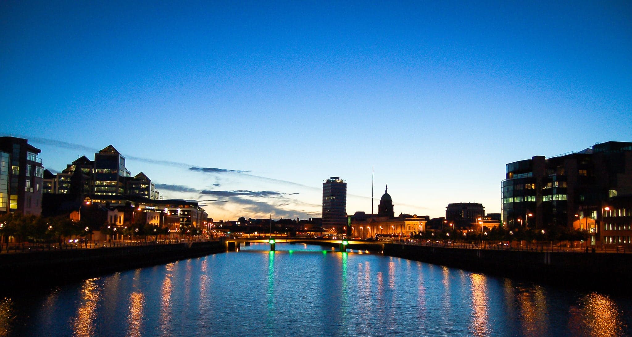 dublin at sunset, bright blue sky in the background