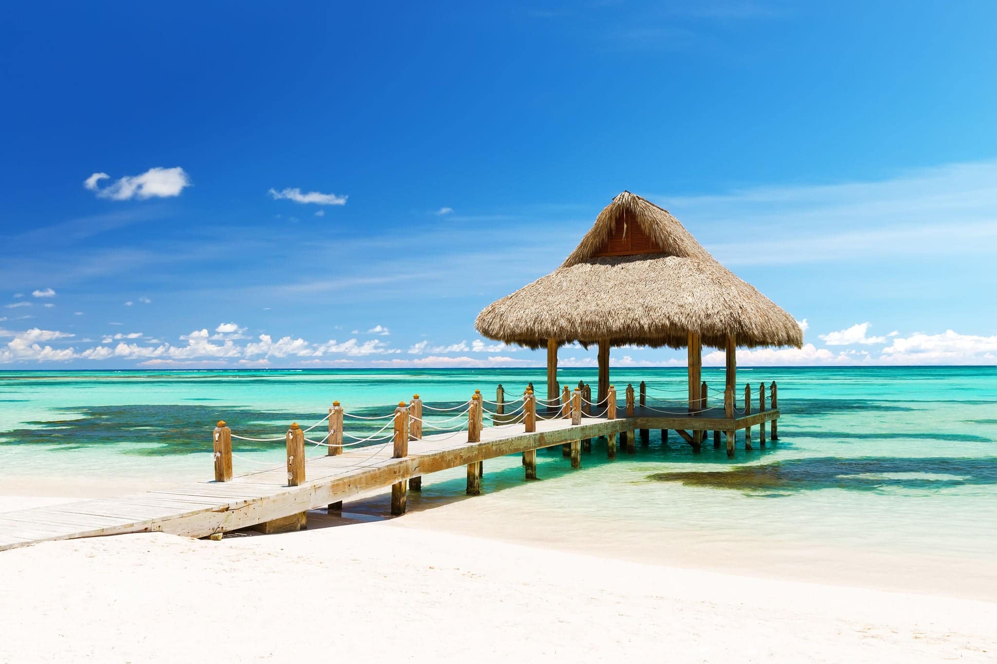 Beautiful gazebo on the tropical white sandy beach in Cap Cana, Dominican Republic