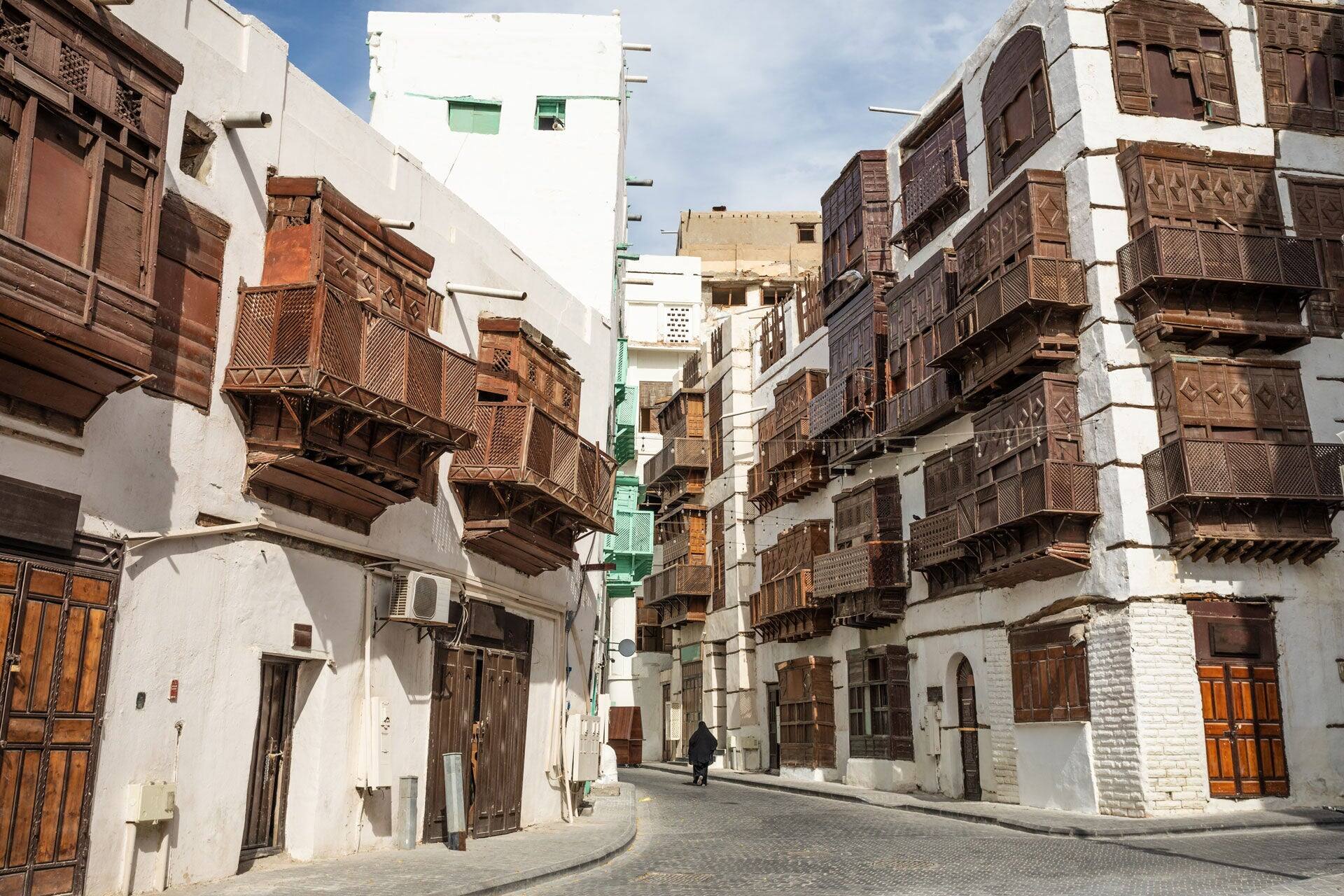 Middle East, Saudi Arabia, Mecca, Jeddah, Al-Balad. Traditional Hijazi tower house with wooden Rosan windows and balconies.