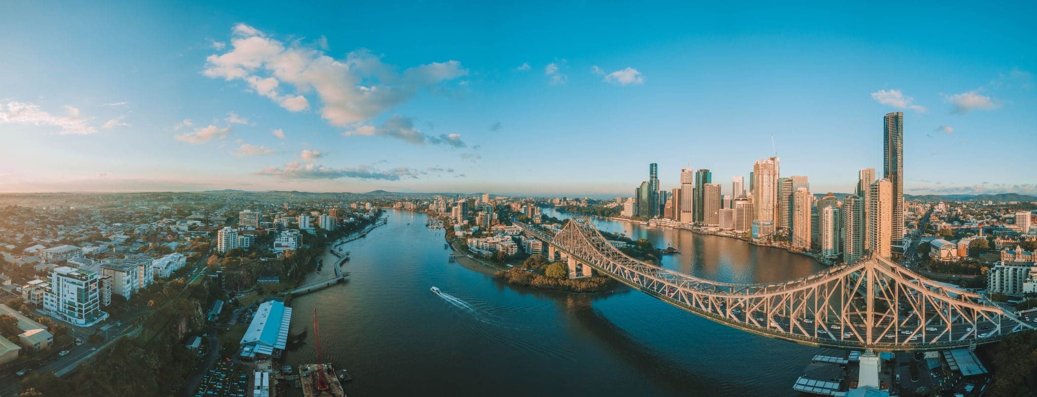 Panorama sunrise aerial shot of Brisbane, the Story Bridge and the Brisbane River