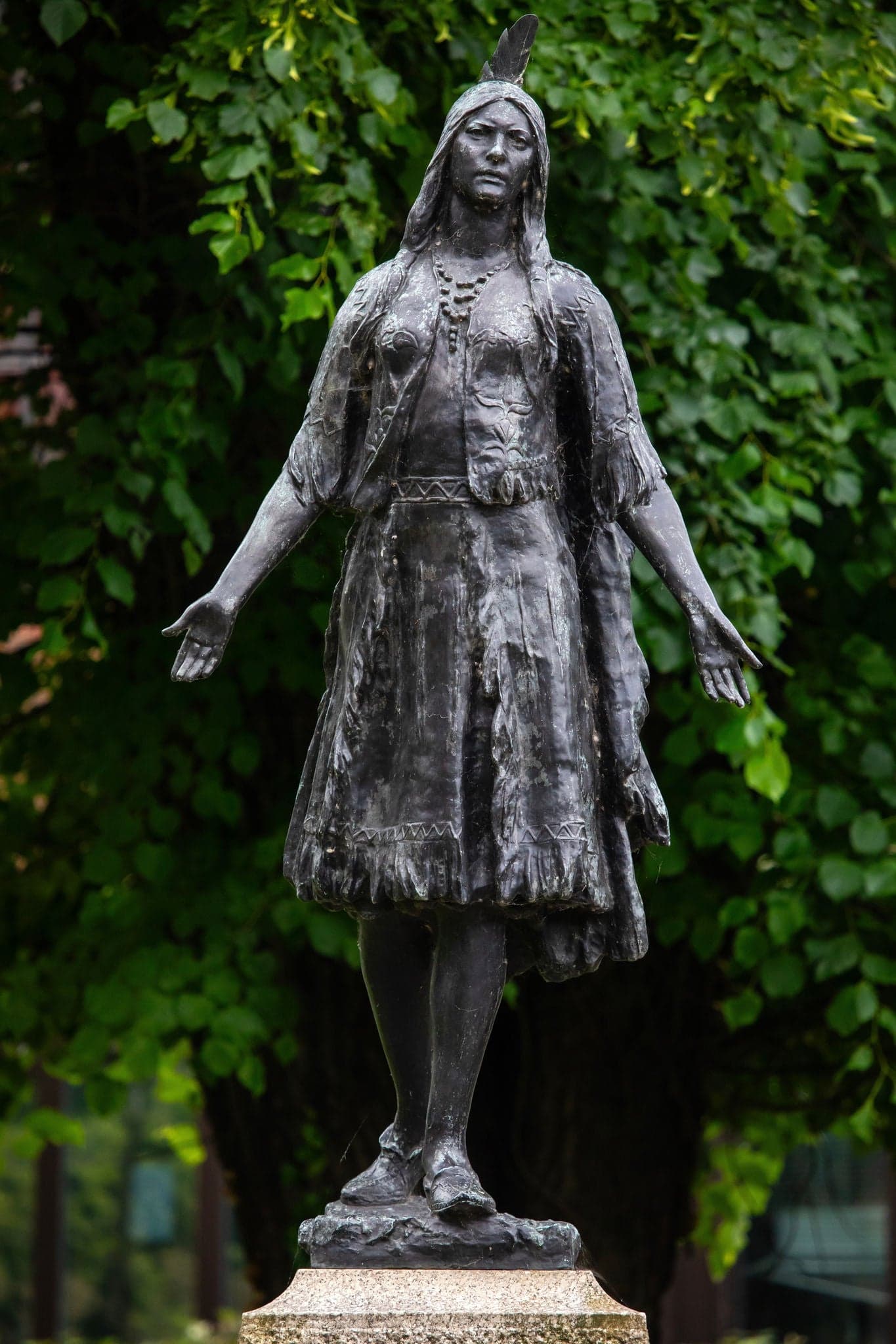Gravesend, UK - June 9th 2024: The memorial statue of Princess Pocahontas, located in the churchyard of St. Georges Church in Gravesend, Kent, UK.