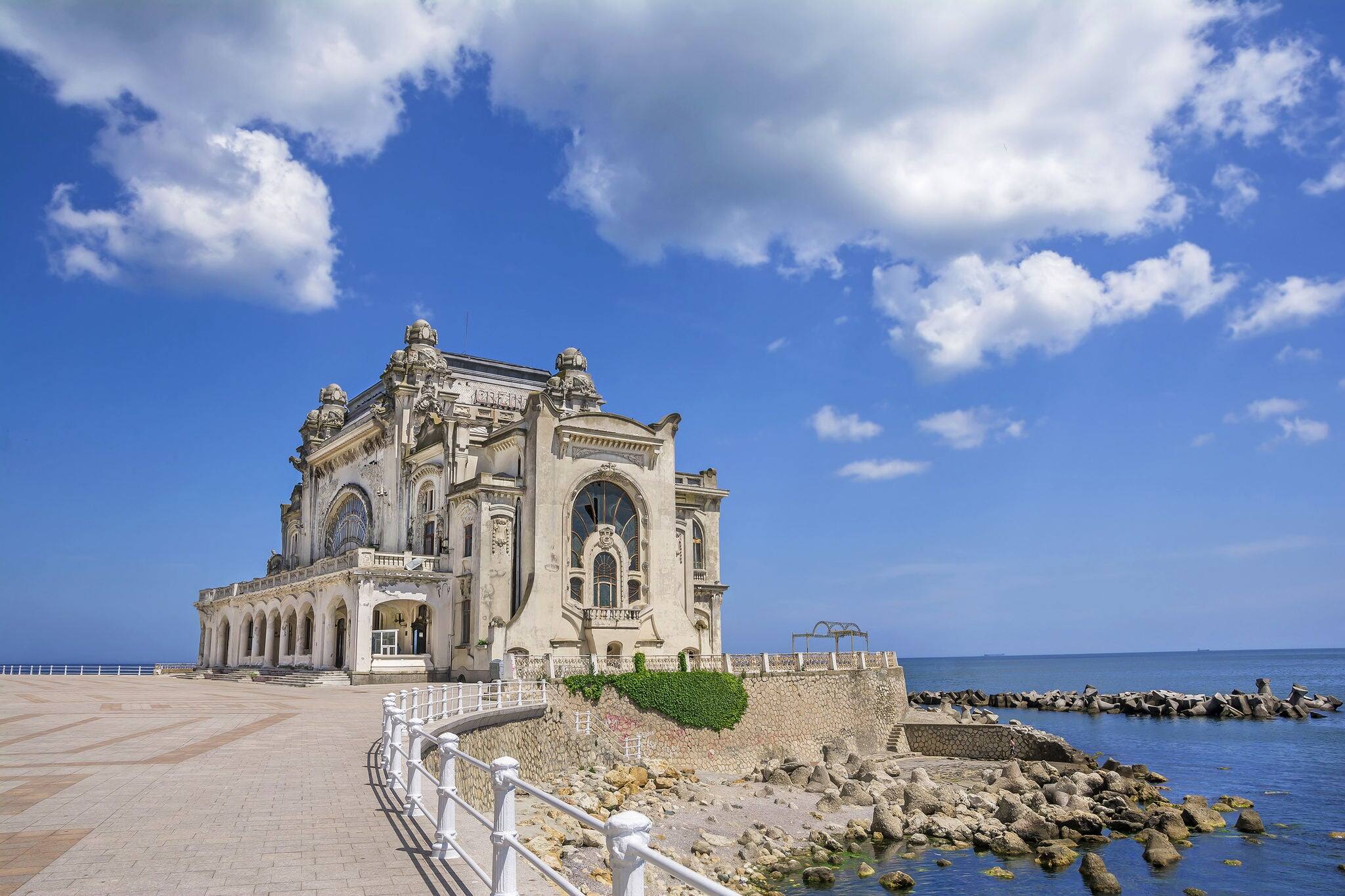 Beautiful summer landscape with Old Casino, symbol of the Constanta city, Romanian coastal destination at  the Black Sea