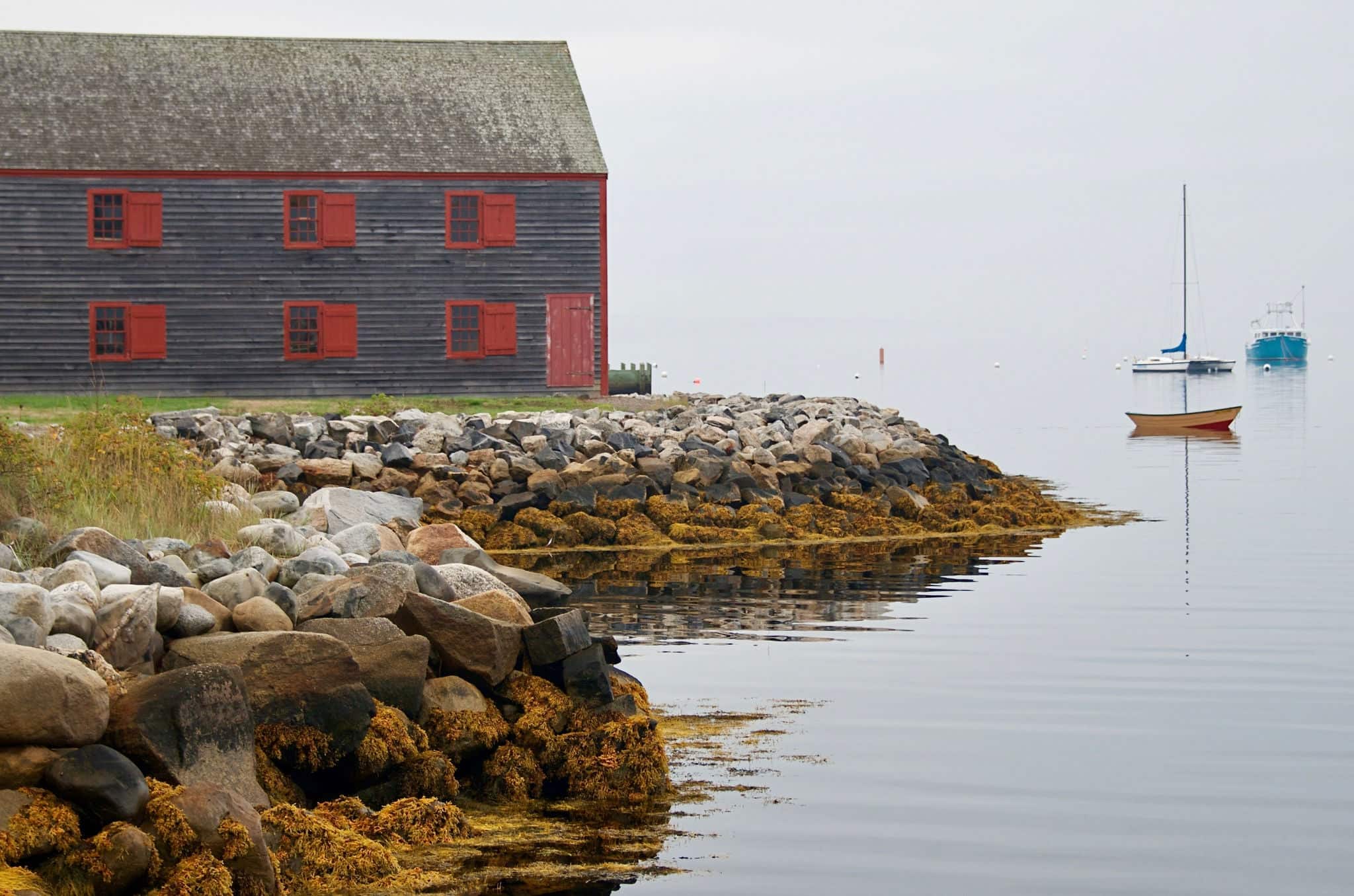 Nova Scotia Shelburne Village Seaside Wooden Warehouse and Sailboat on Foggy Day
