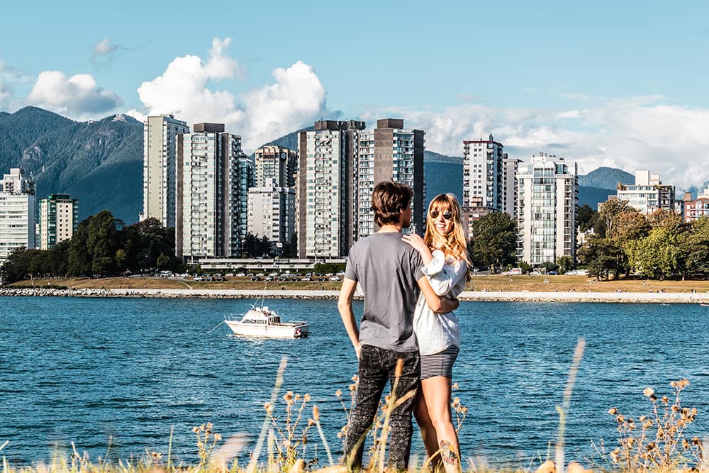 Couple in front of Sunset Beach, Vancouver, BC, Canada Couple in front of Sunset Beach, Vancouver, BC, Canada