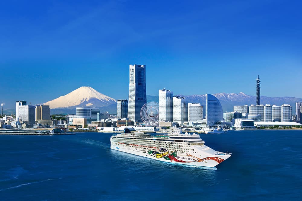 Norwegian Jewel with the Tokyo skyline in the background