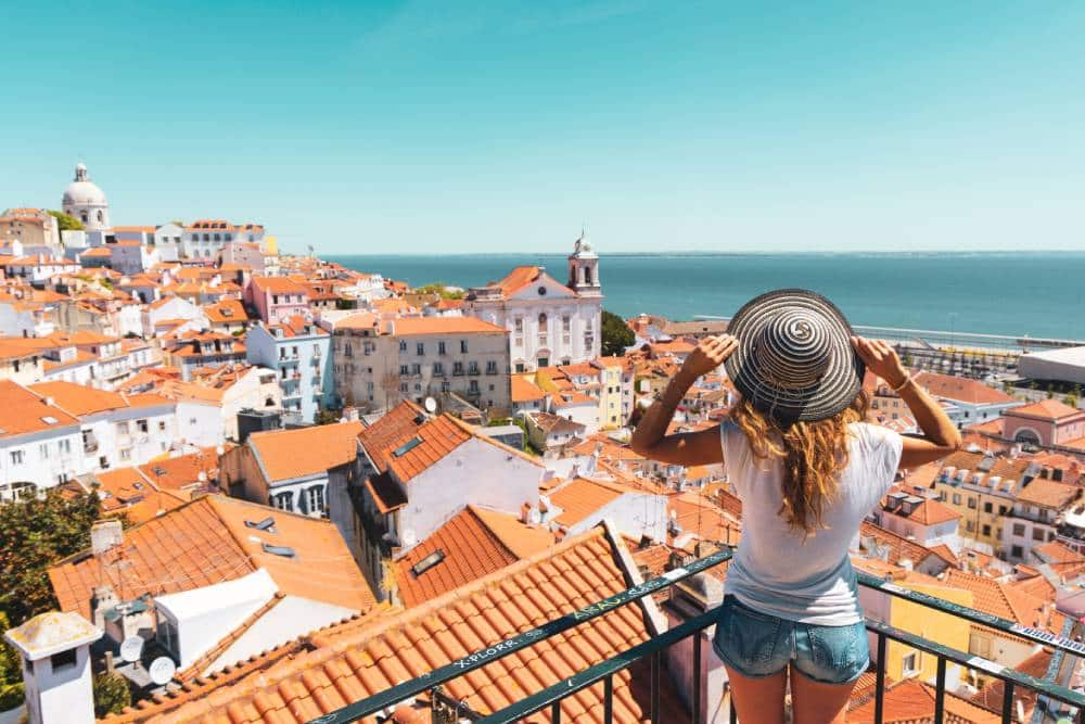 Traveler overlooking Lisbon, Portugal