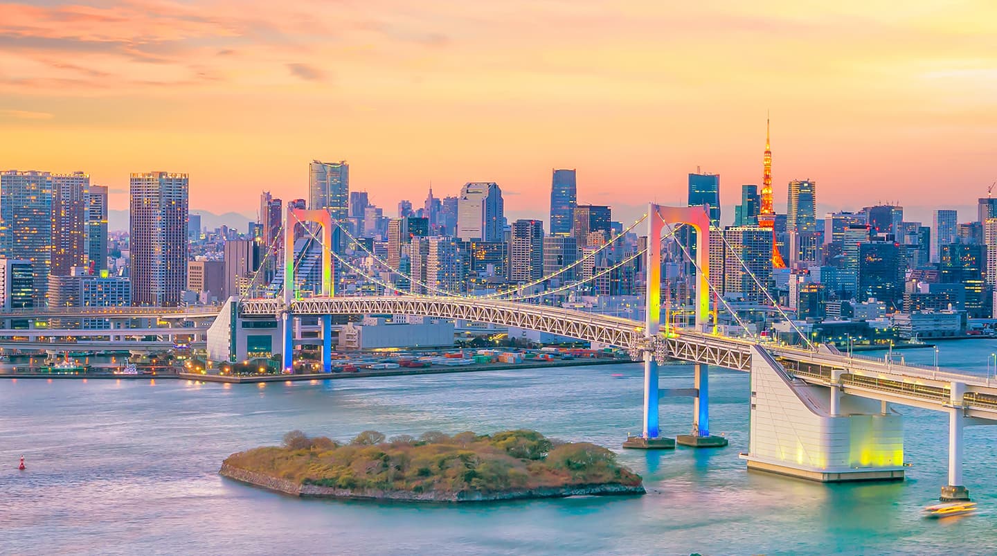 Tokyo tower and rainbow bridge at sunset