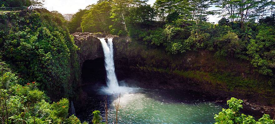 Witness the misty colors of Rainbow Falls in Hilo, Hawaii.
